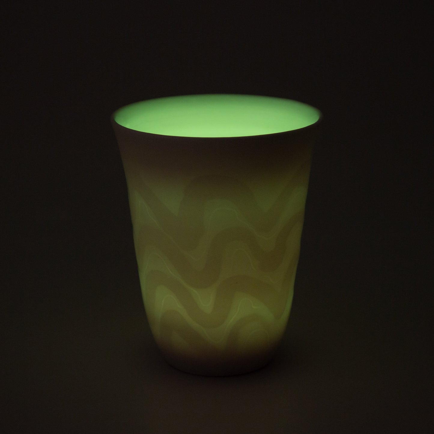 white porcelain candle holder