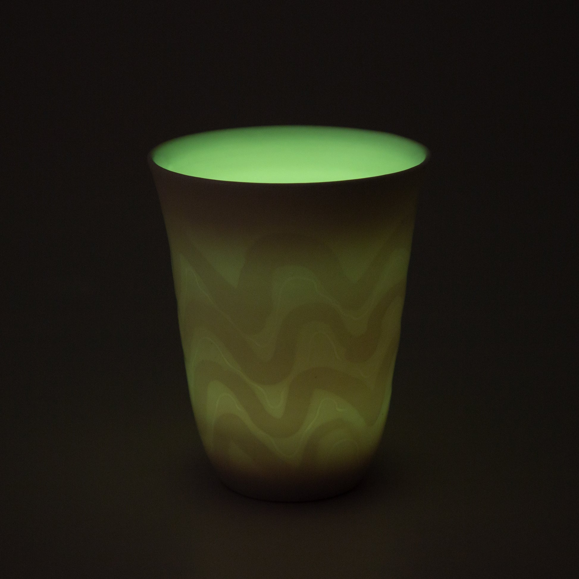 white porcelain candle holder