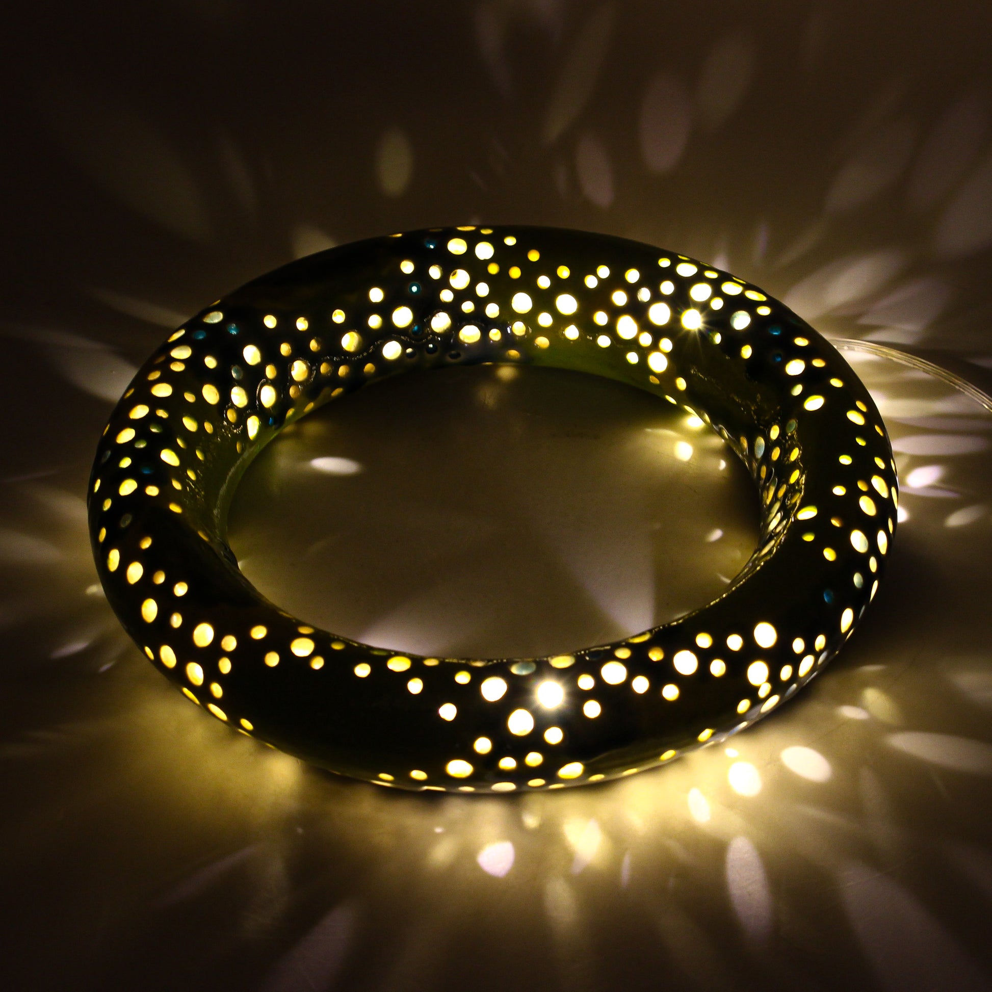 Clay circle lamp, illuminated