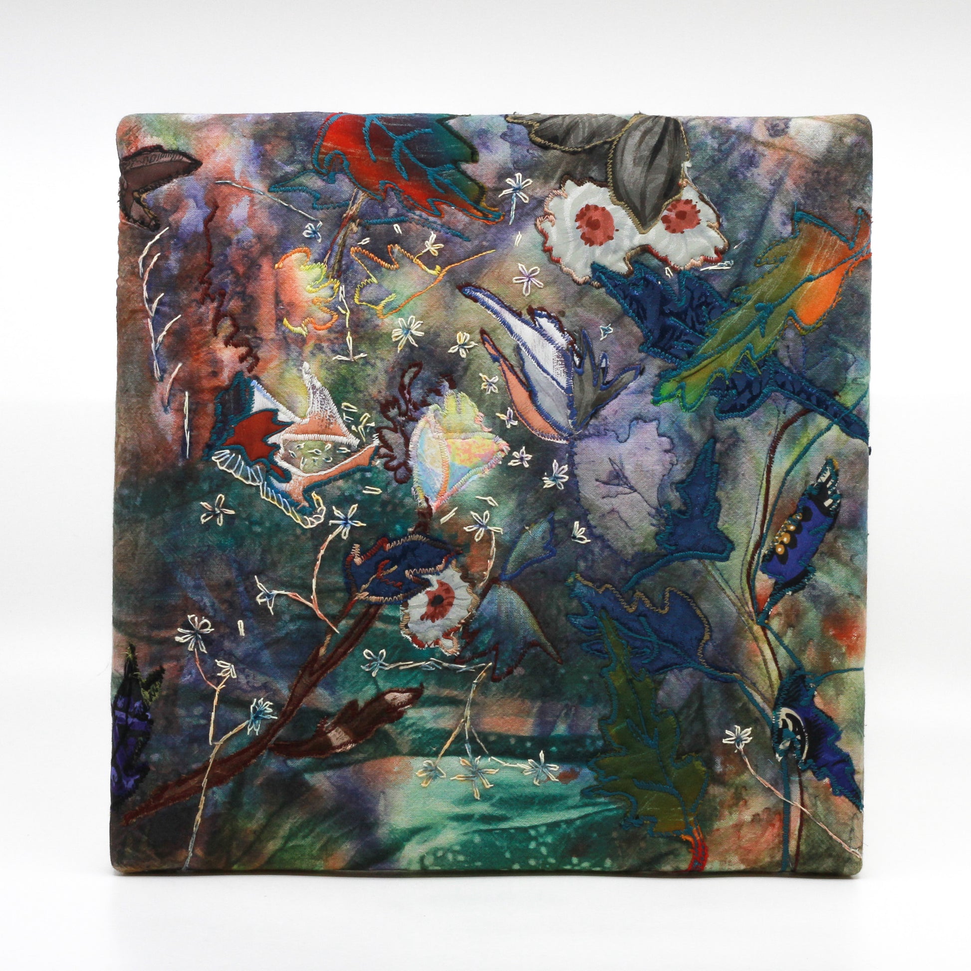 Thread painting of flowers and leaves