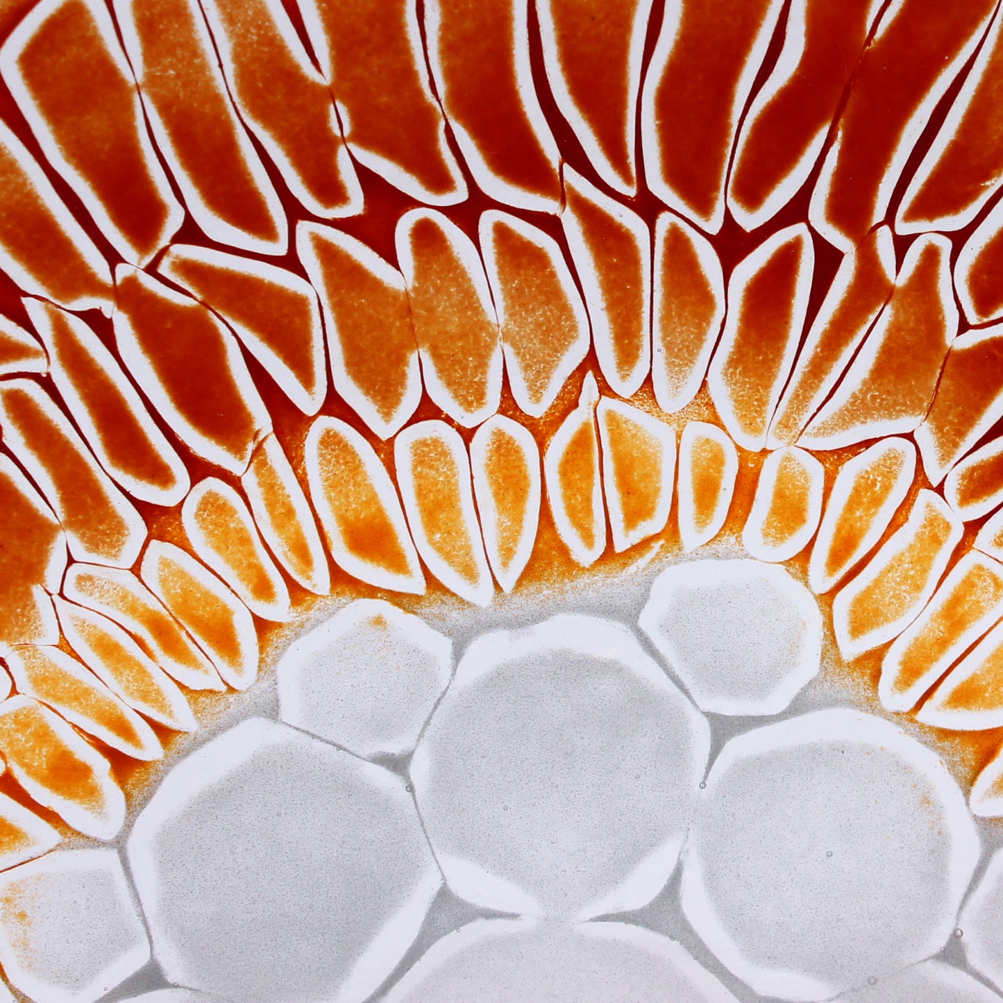 Red and orange glass plate: detail