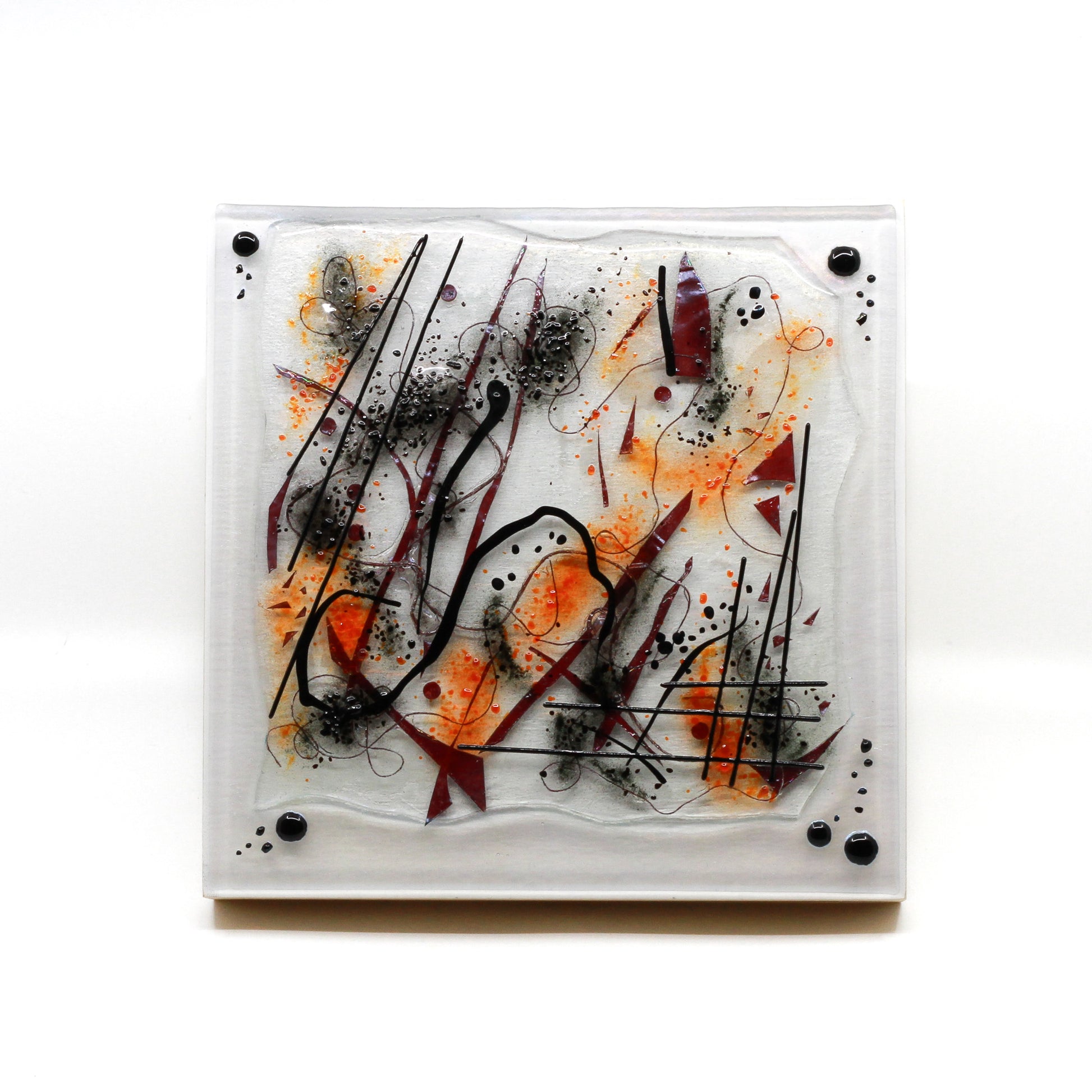 Abstract glass plate mounted on wood