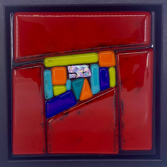 Red glass mosaic with small colourful tiles in centre