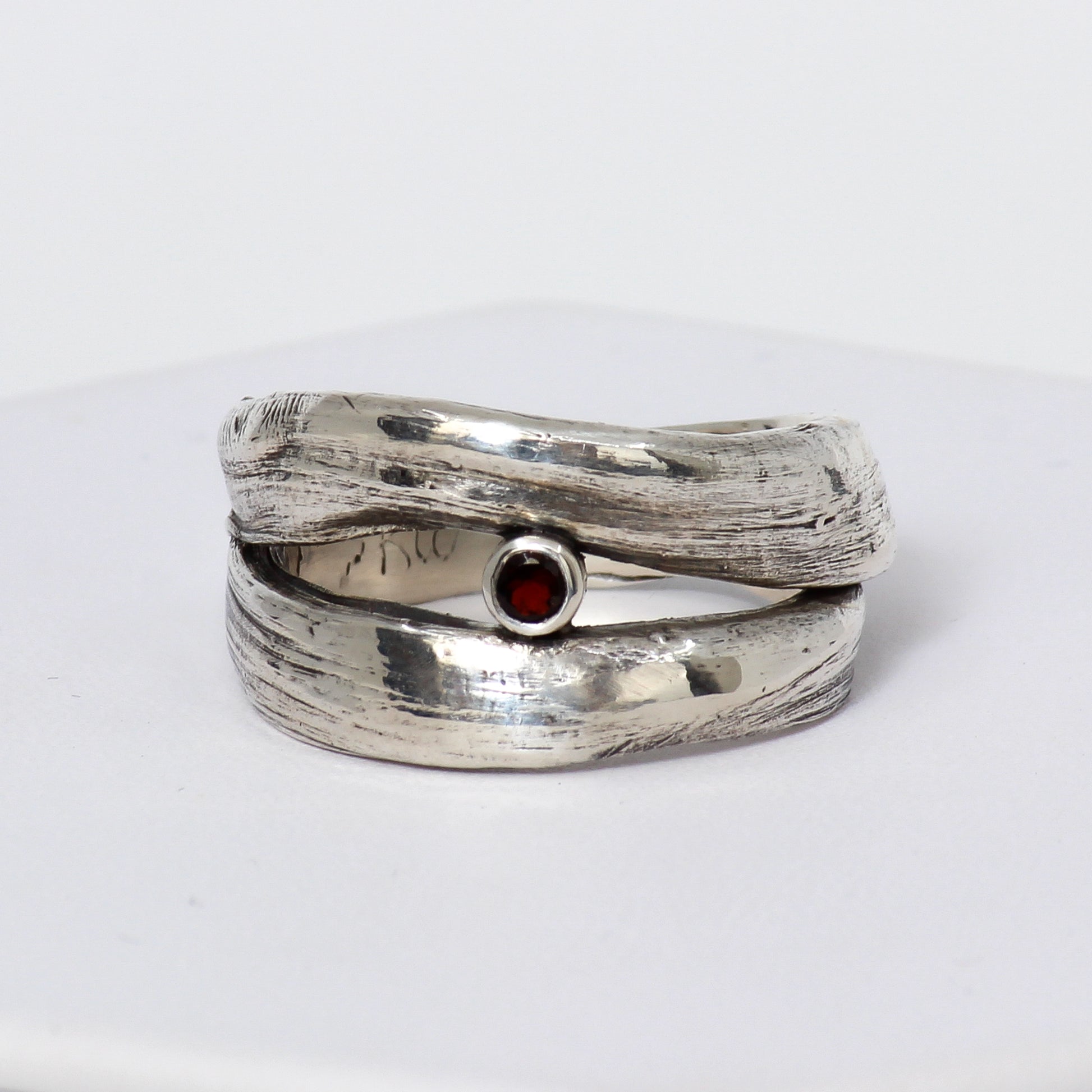 silver ring with red garnet