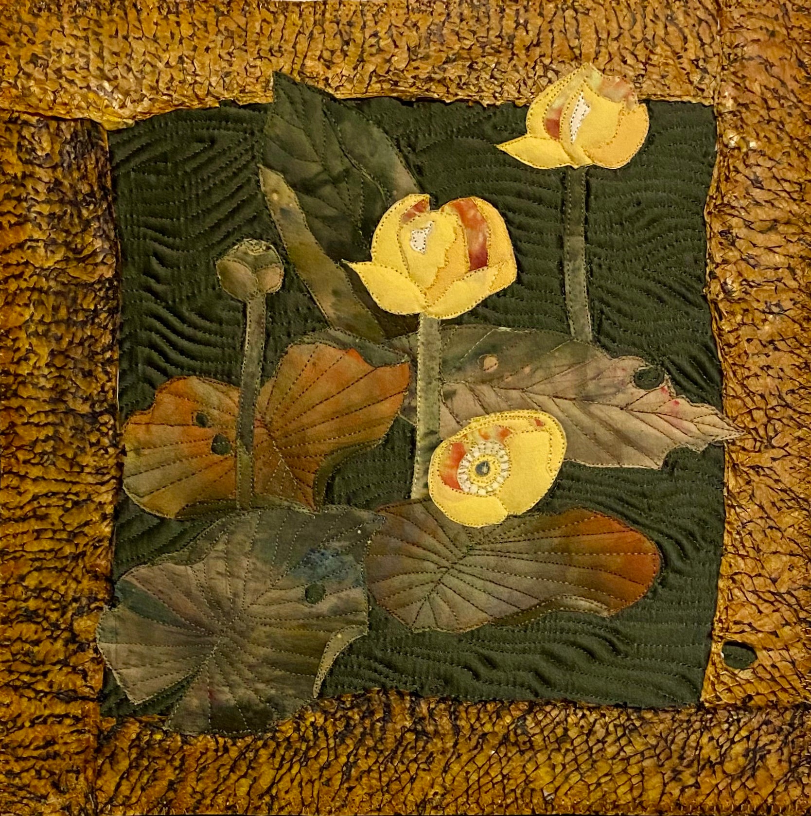 quilting of yellow flowers framed with dried fish skin