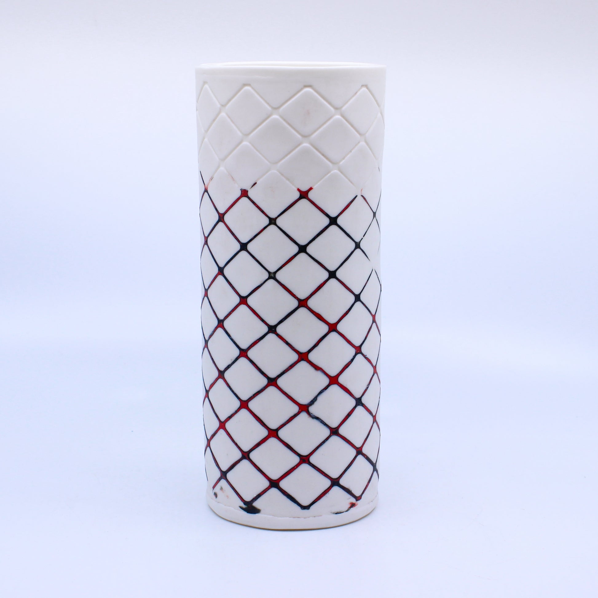 Cross-hatched vase with black and red