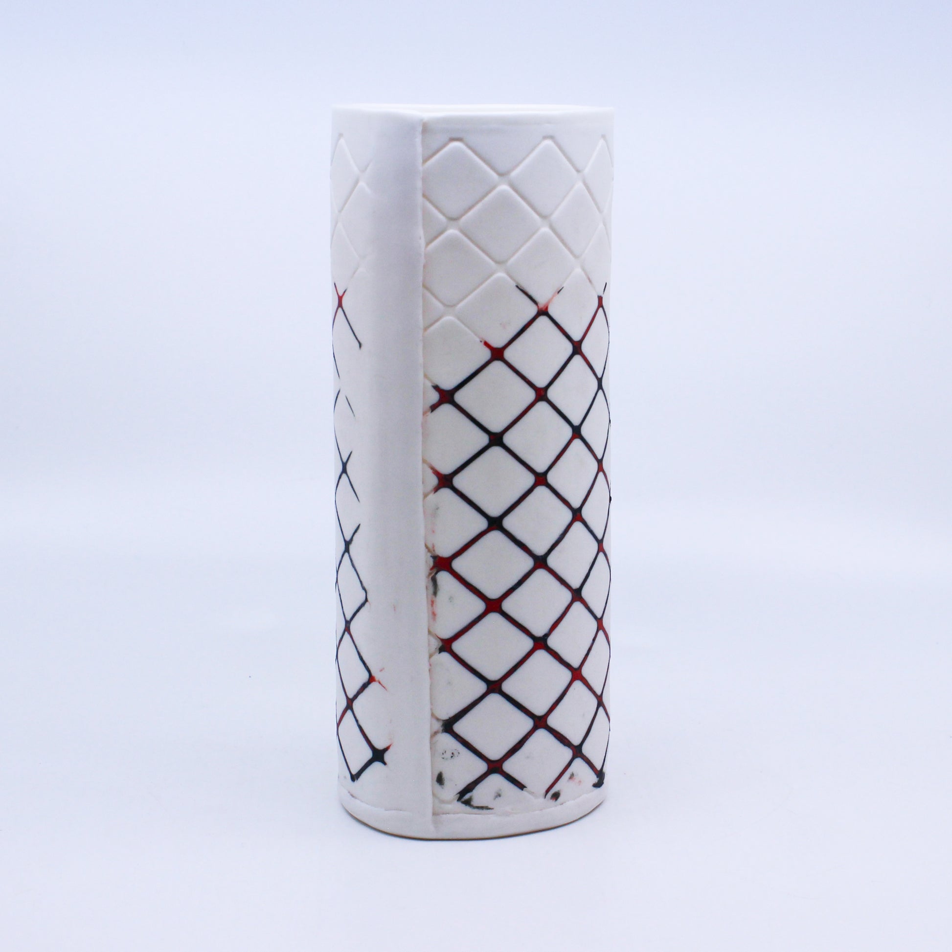 Cross-hatched vase with black and red