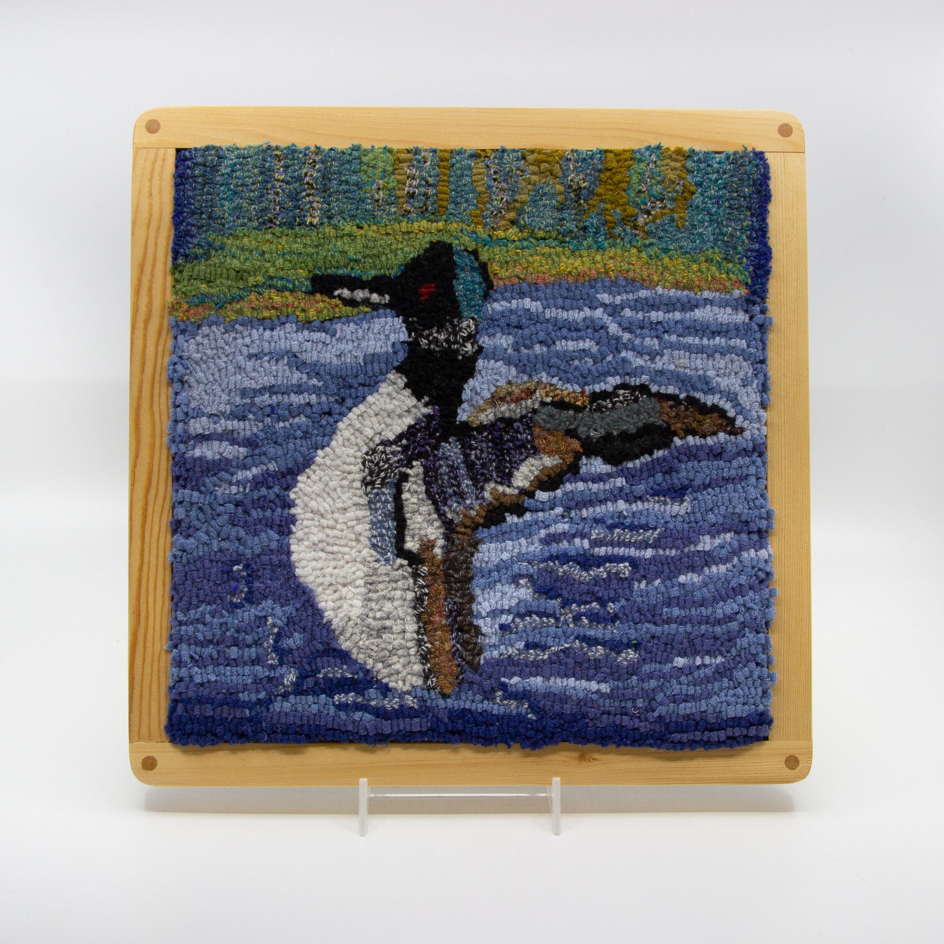 rug hooking of a loon