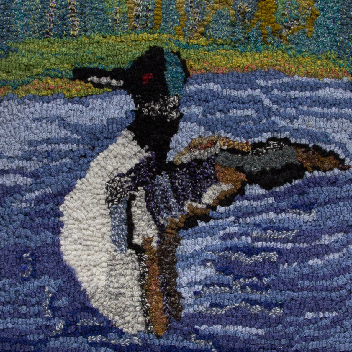 rug hooking of a loon