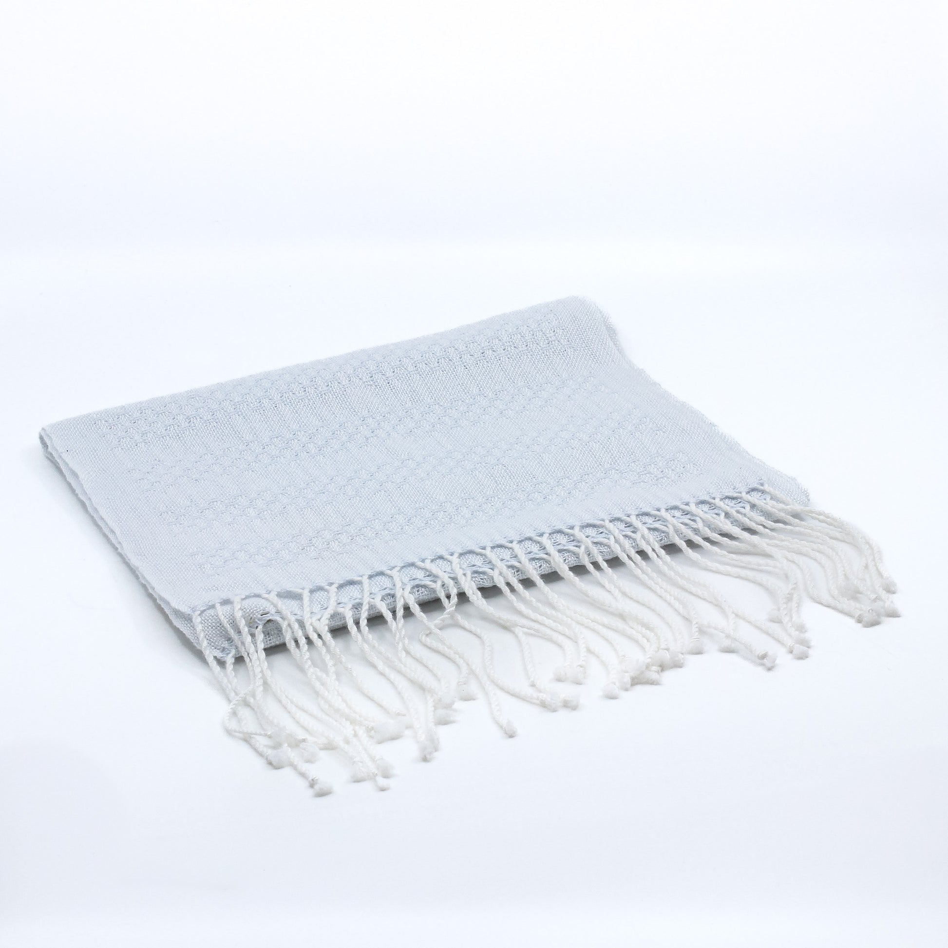 Hand woven white scarf with fringe