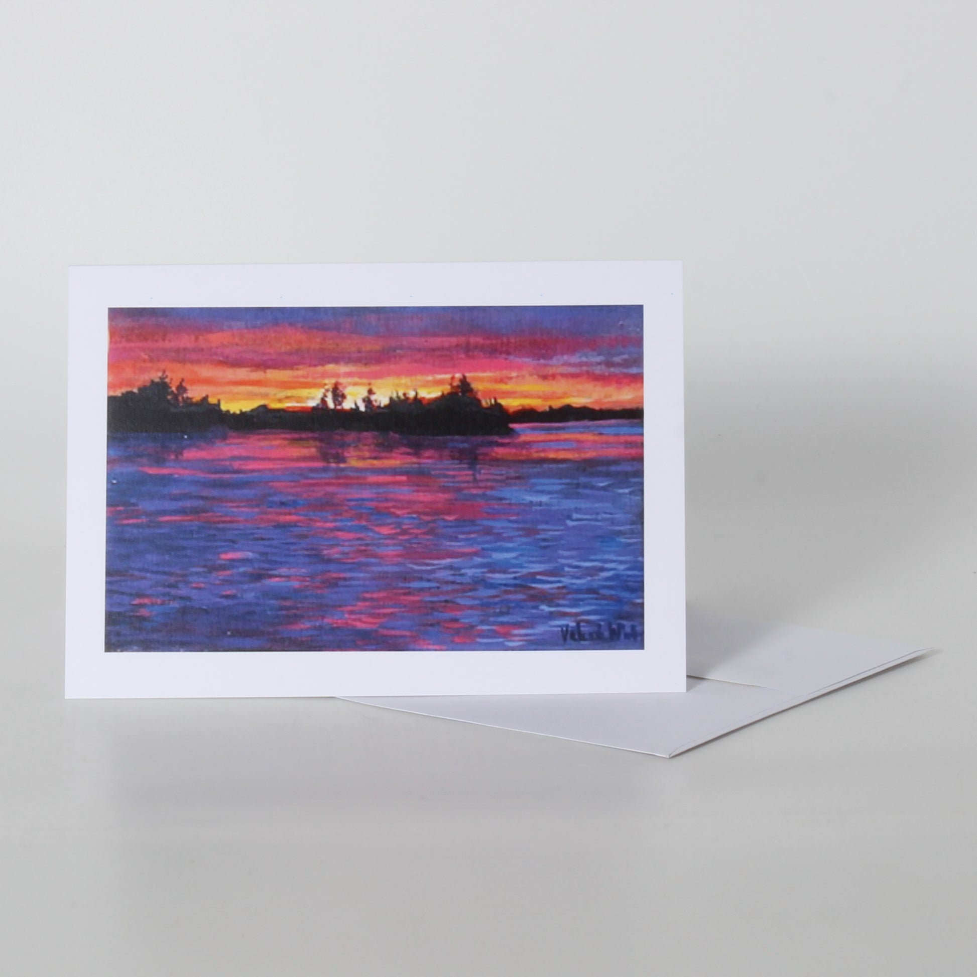 Greeting card of sunset over lake