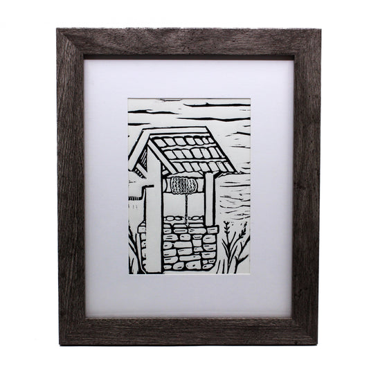 Linocut of stone well