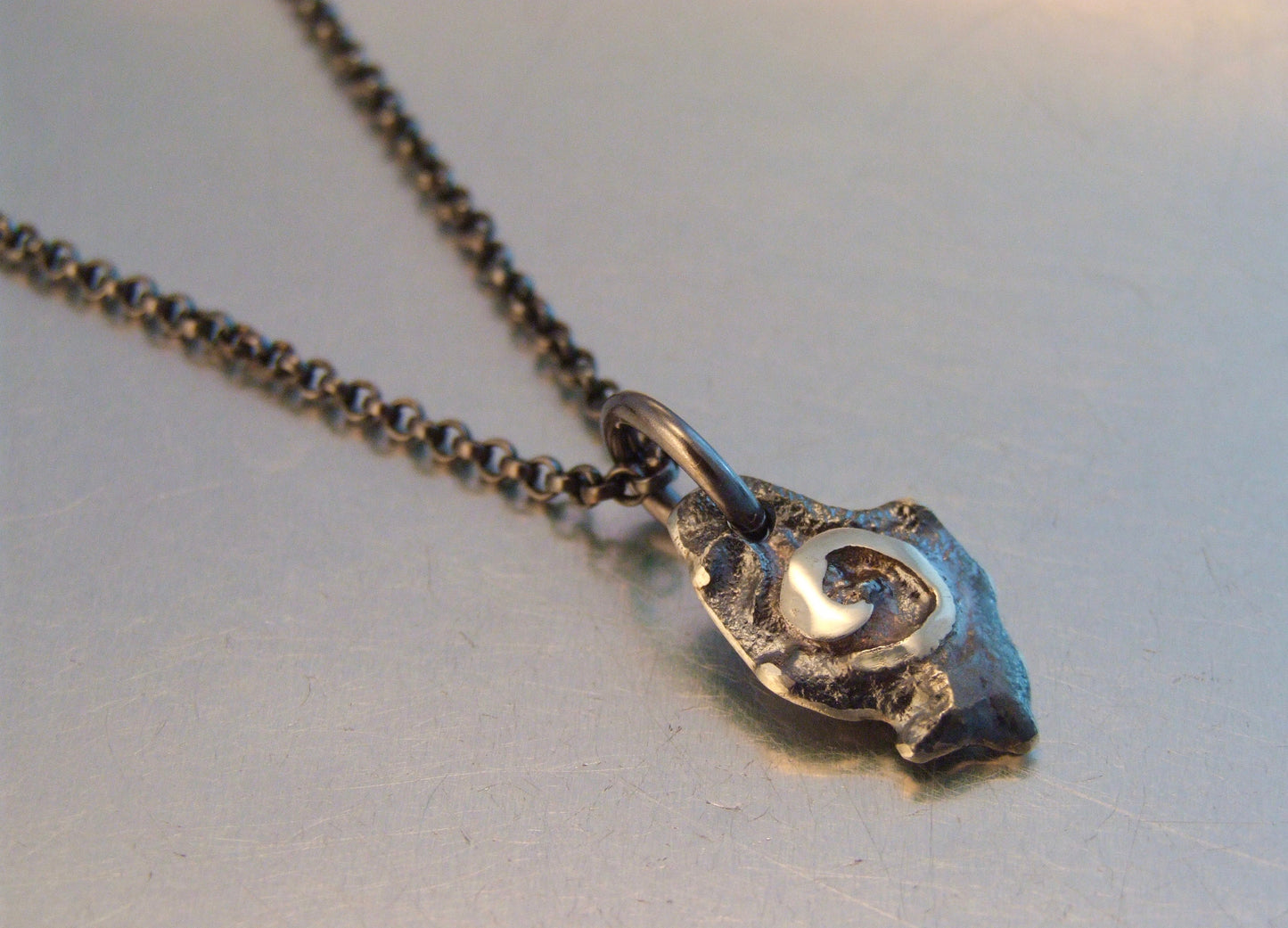 Spiral fuse necklace