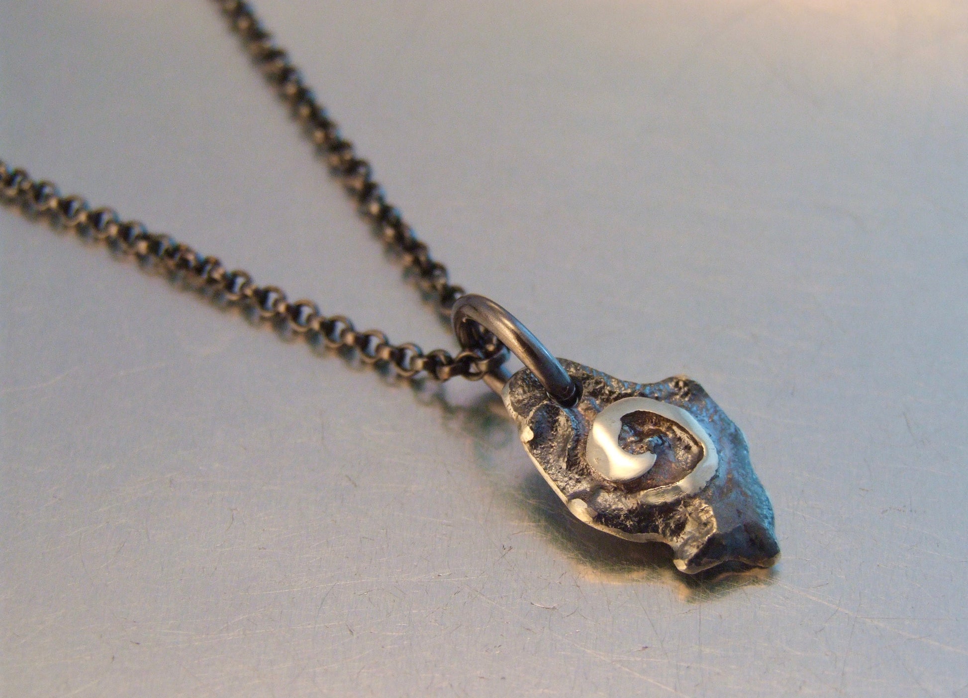 Spiral fuse necklace