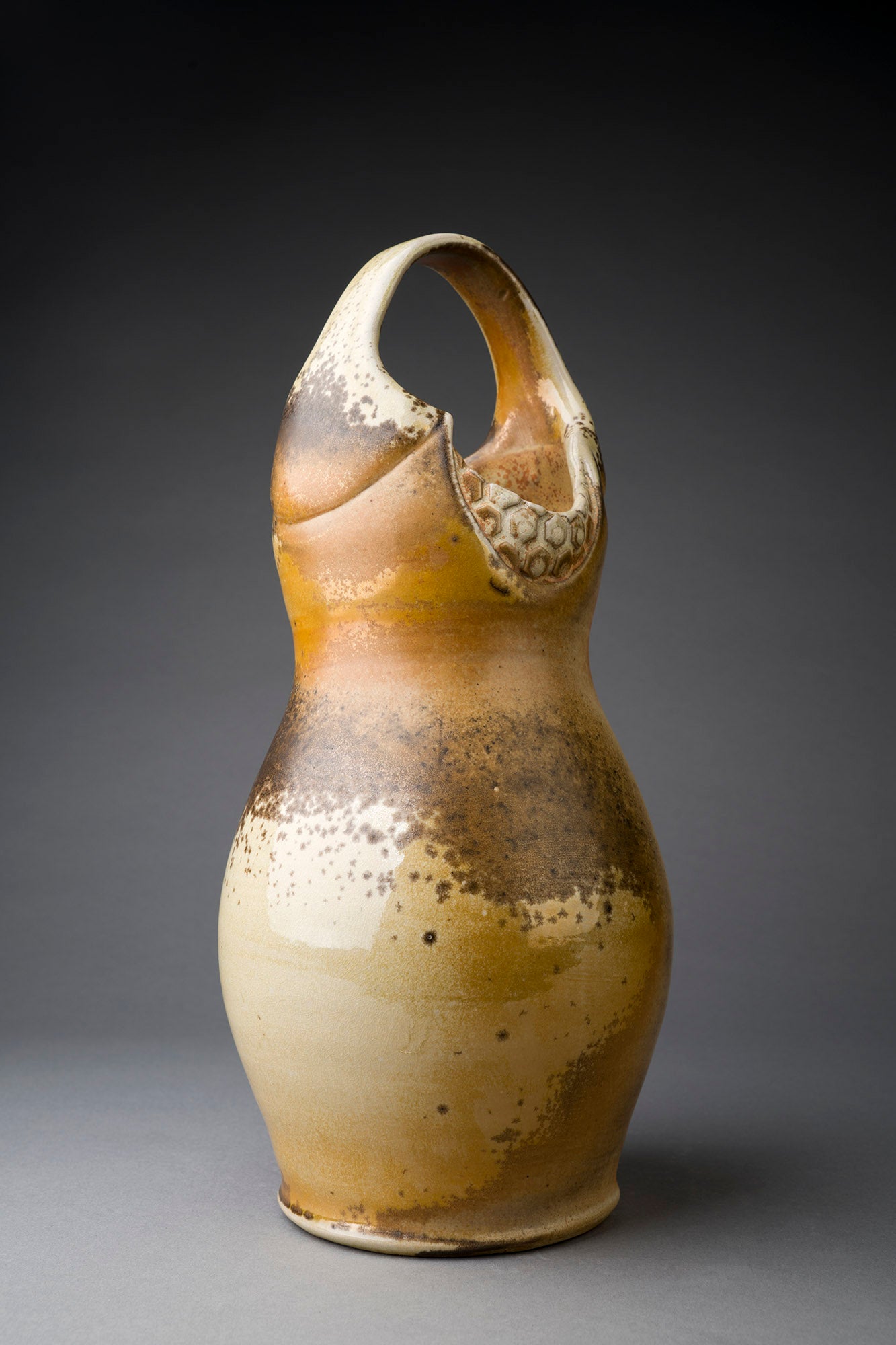 Brown vase with handle