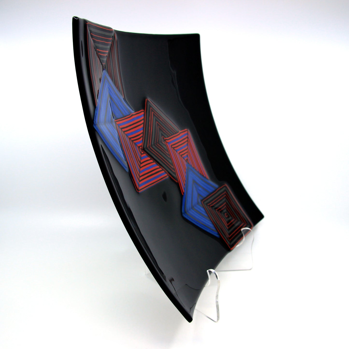 Black glass plate with blue and red squares