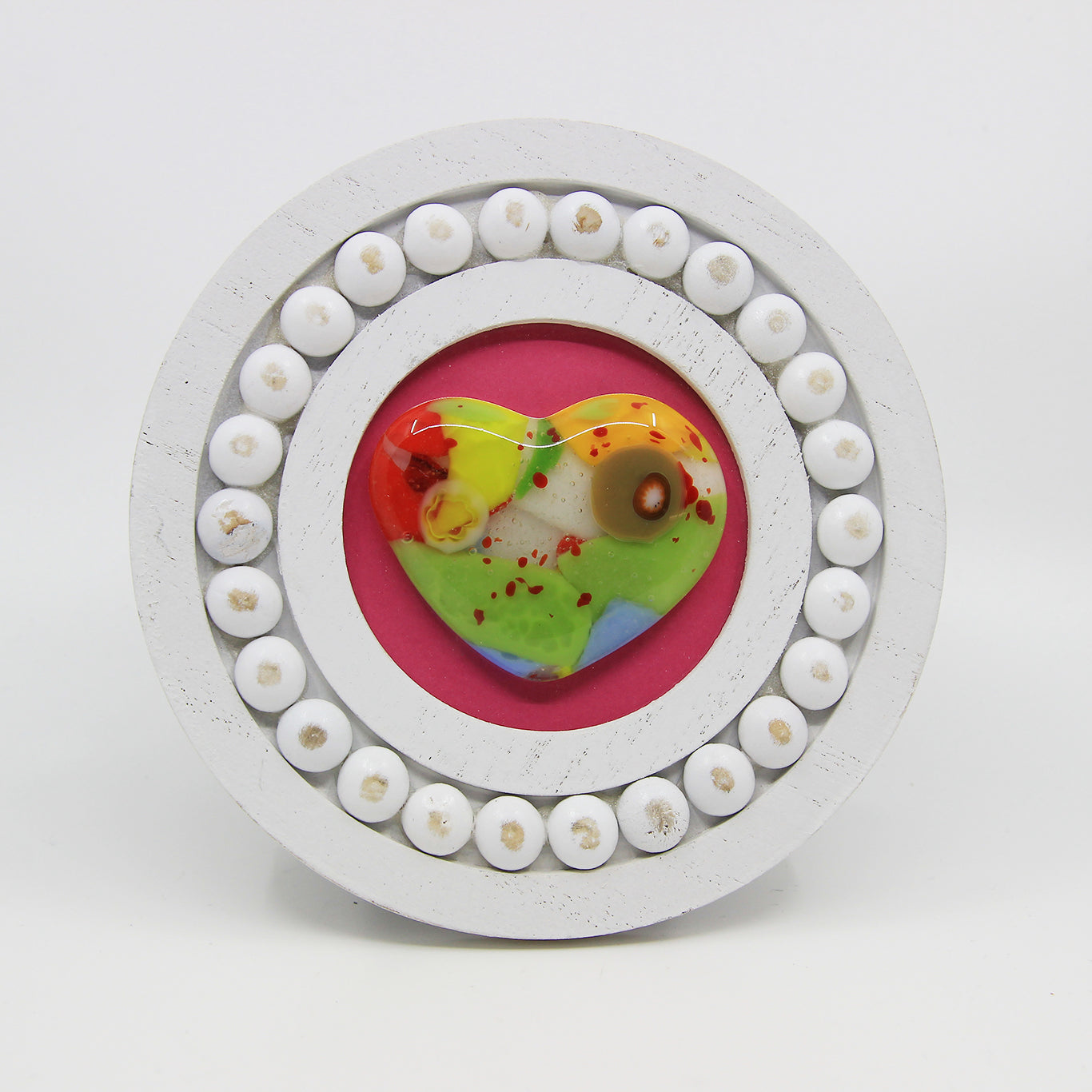 glass heart in frame