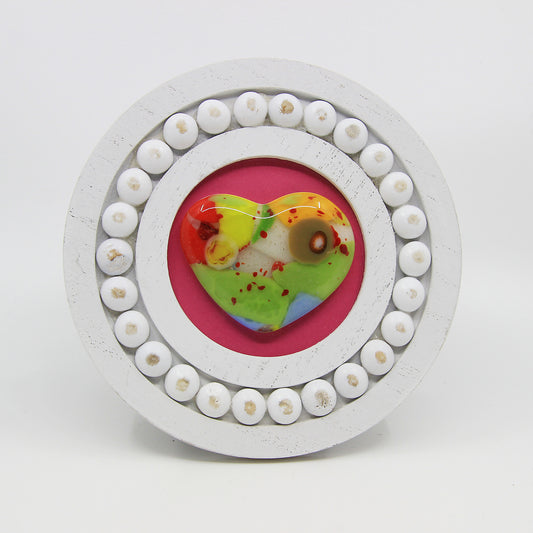 glass heart in frame