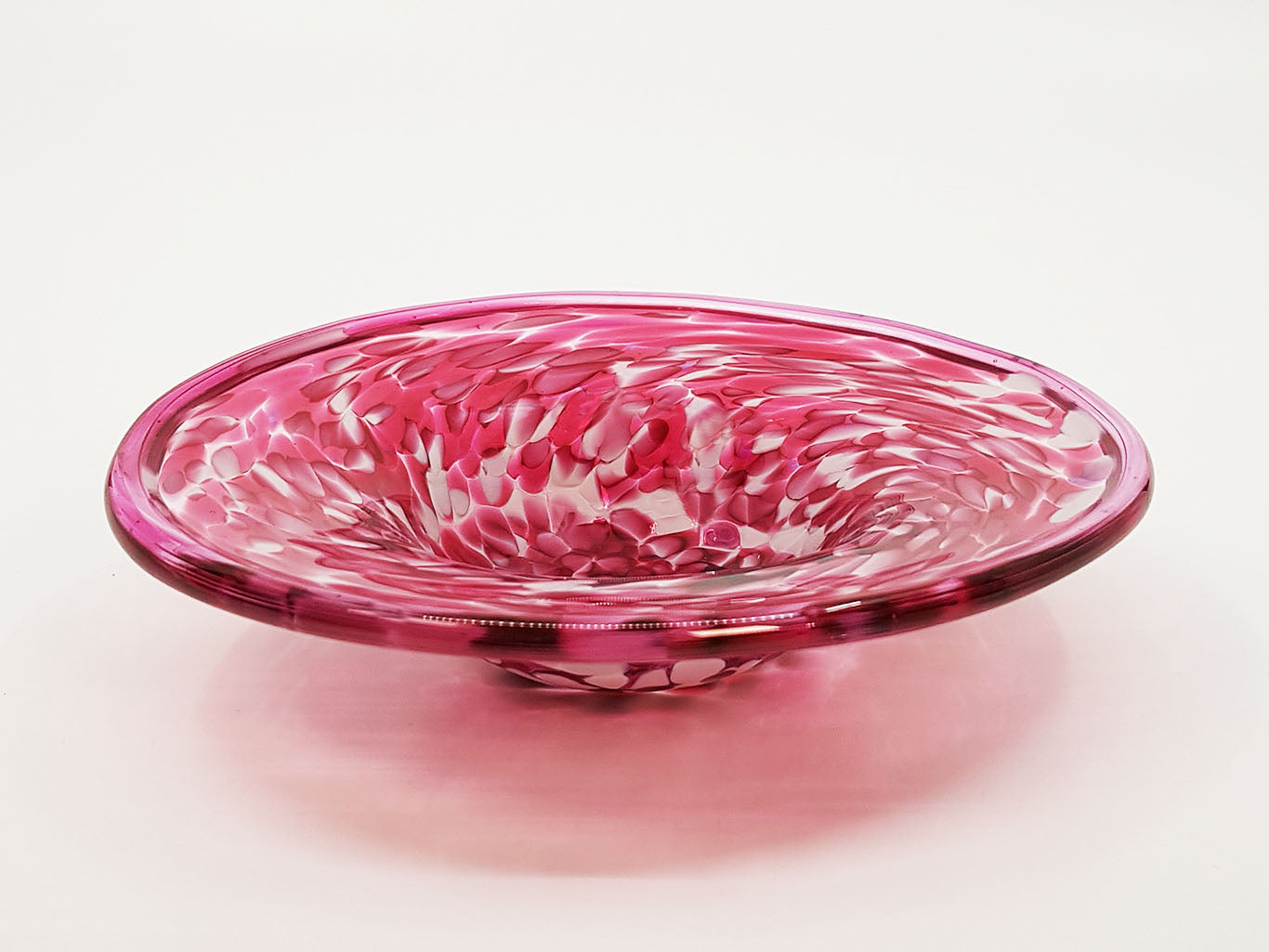 Pink and white bowl with wide rim