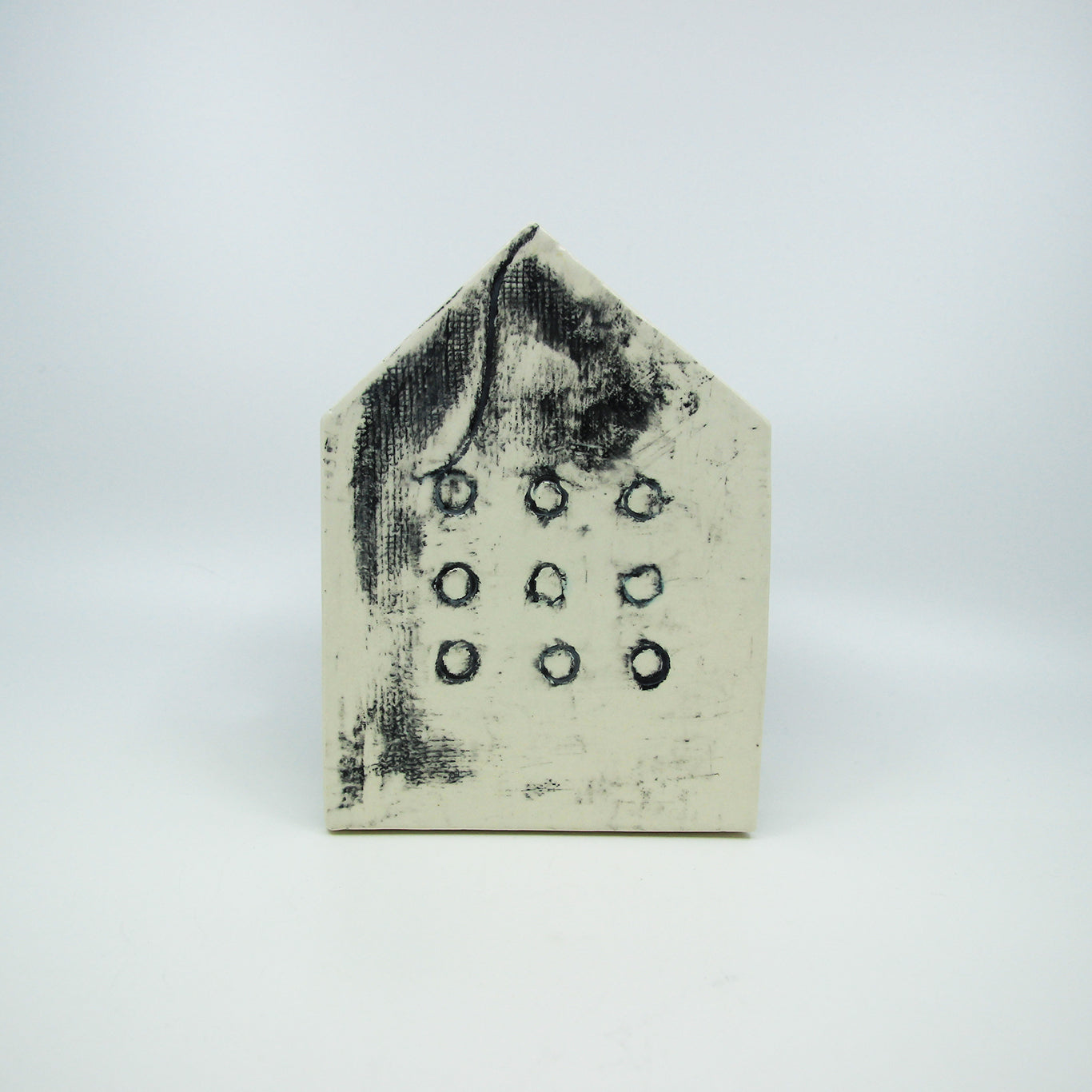 Black and white clay house