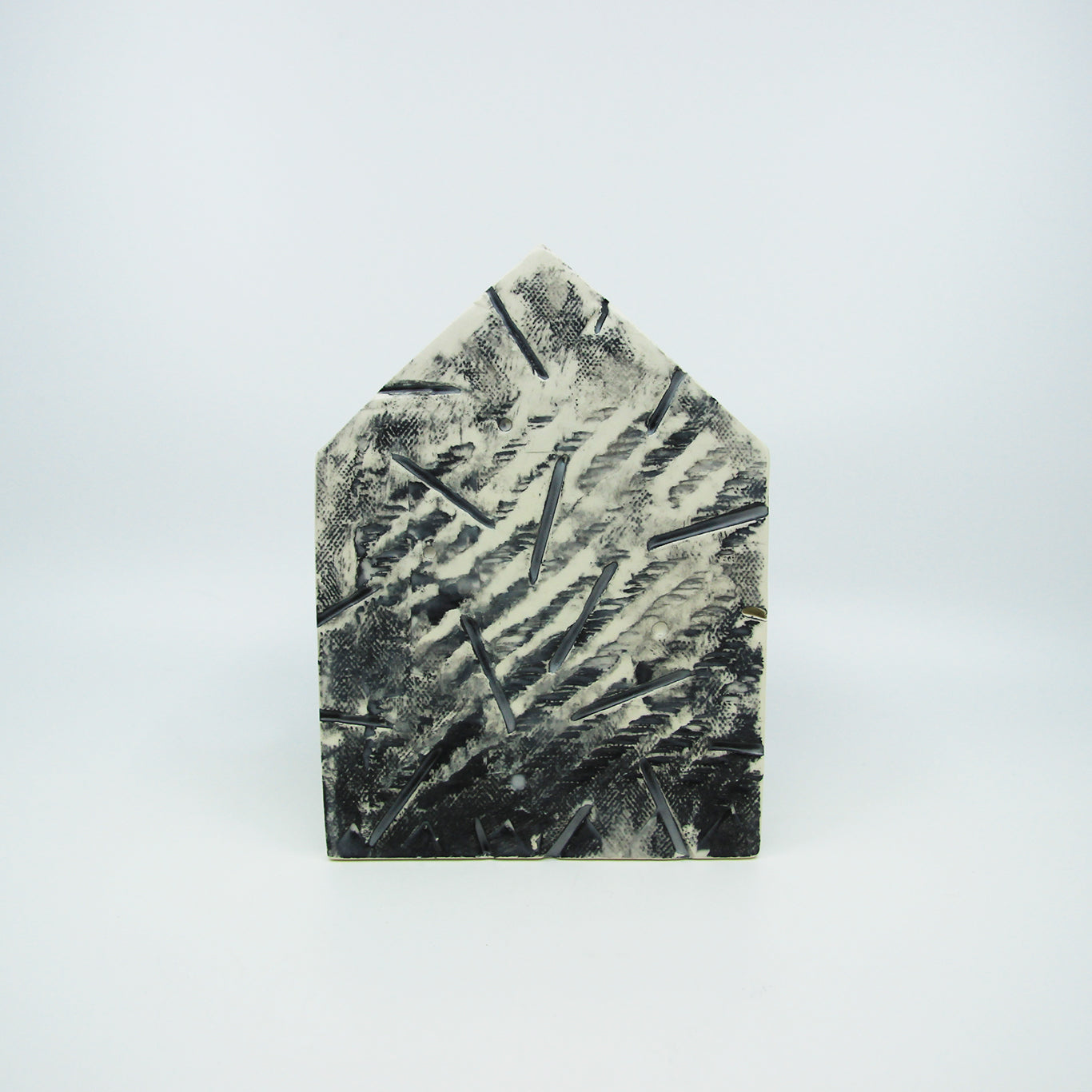 Black and white clay house