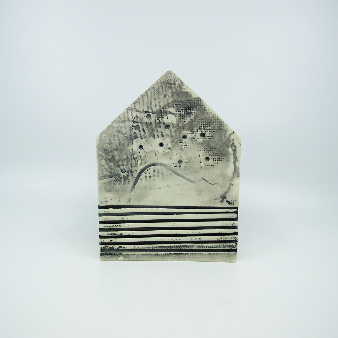 Black and white clay house