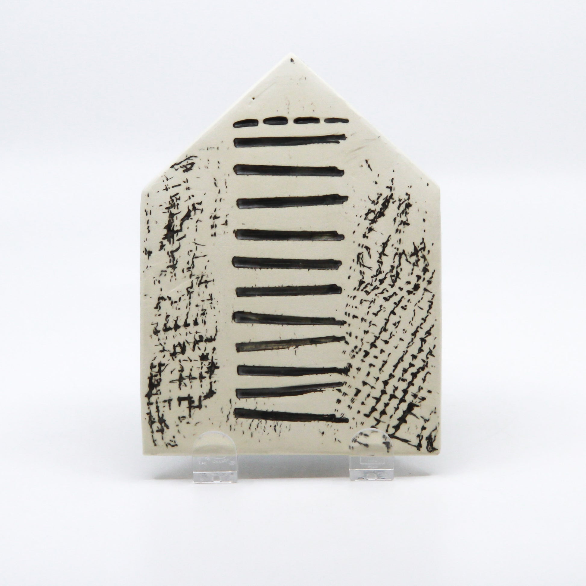 Black and white clay house