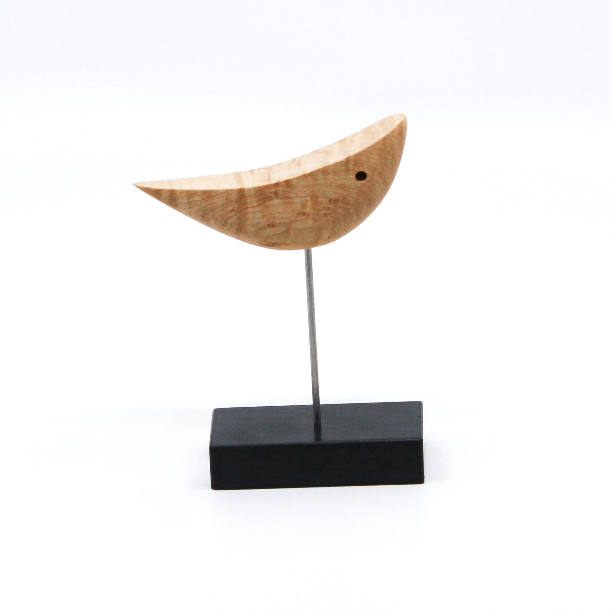 Light brown abstract bird on stand