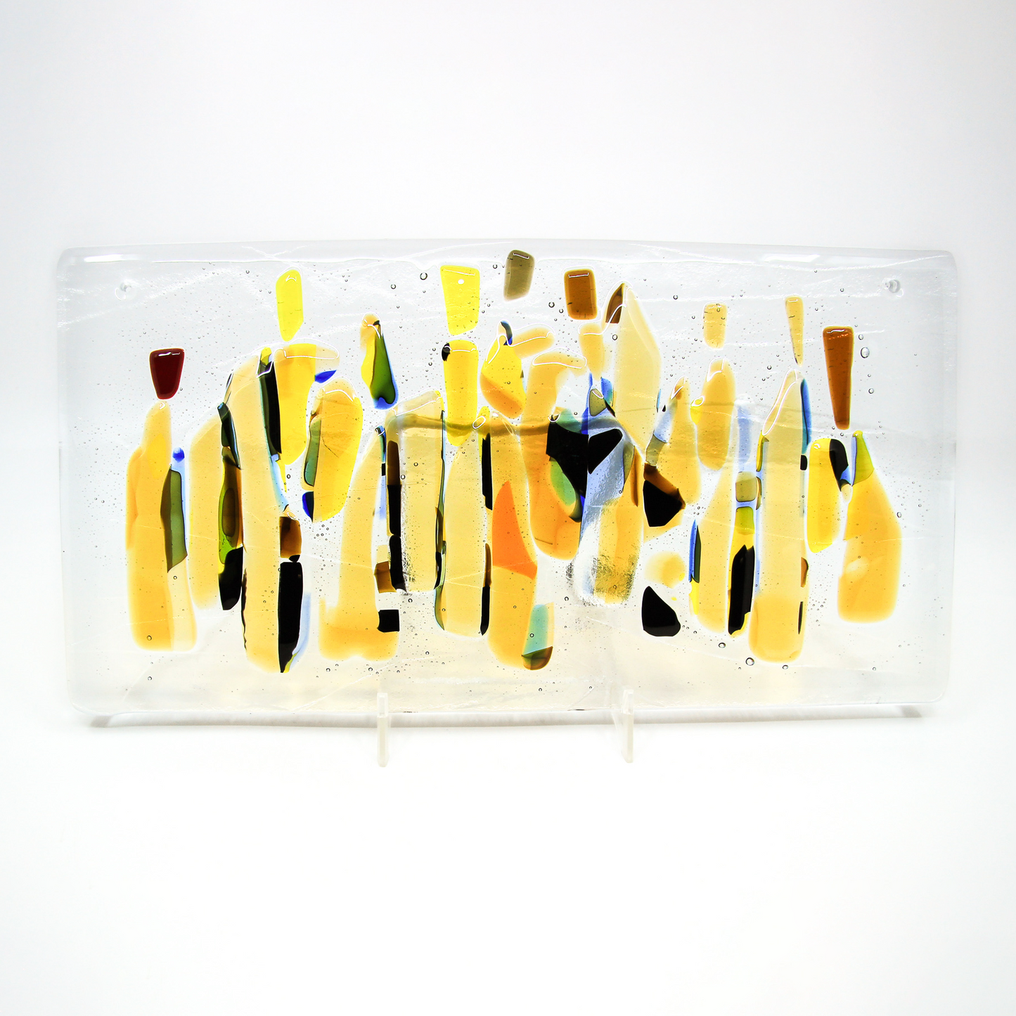Abstract glass tablet of figures in yellow and various shades