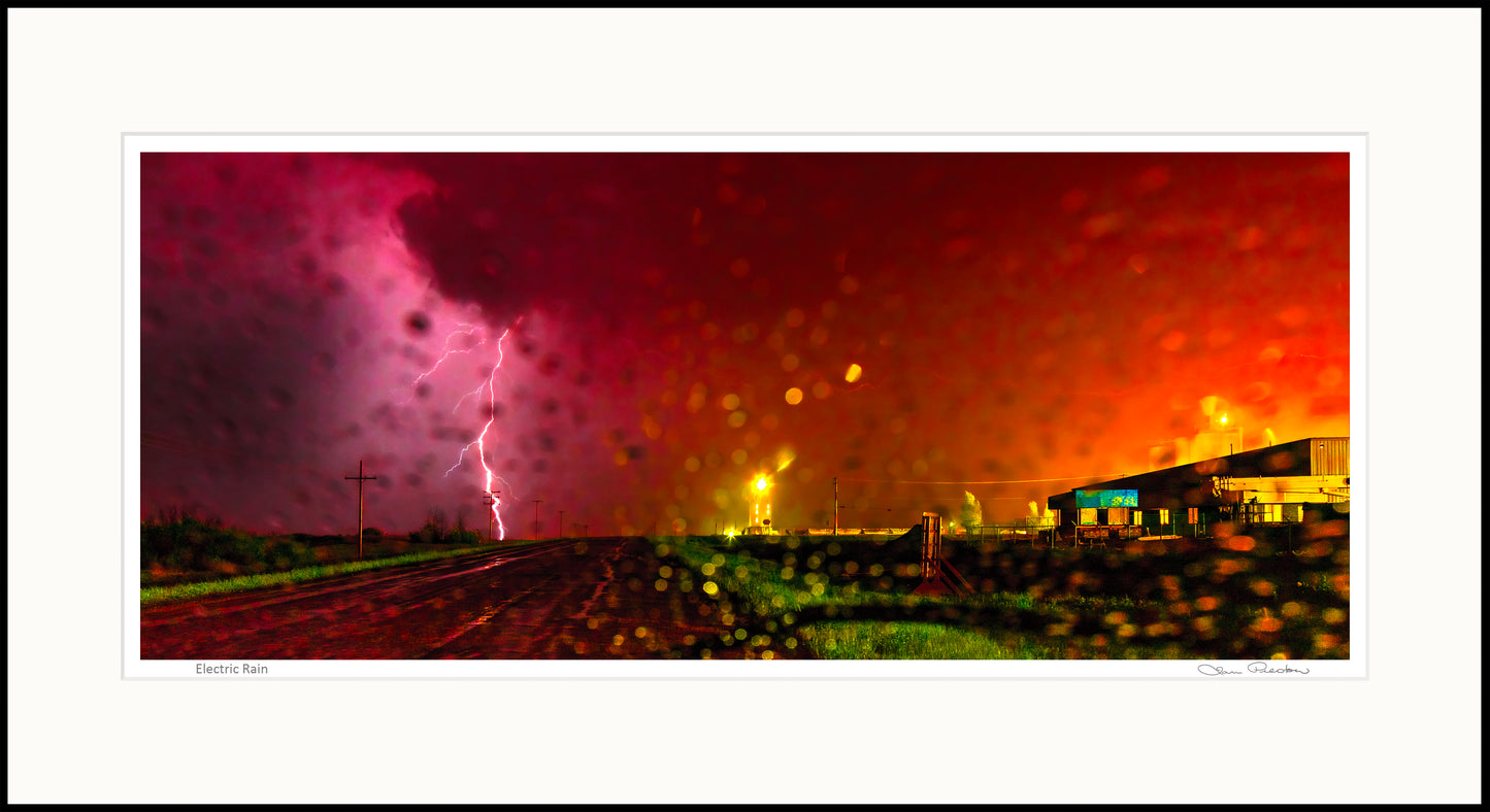 Photo of a lightning strike on a prairie town