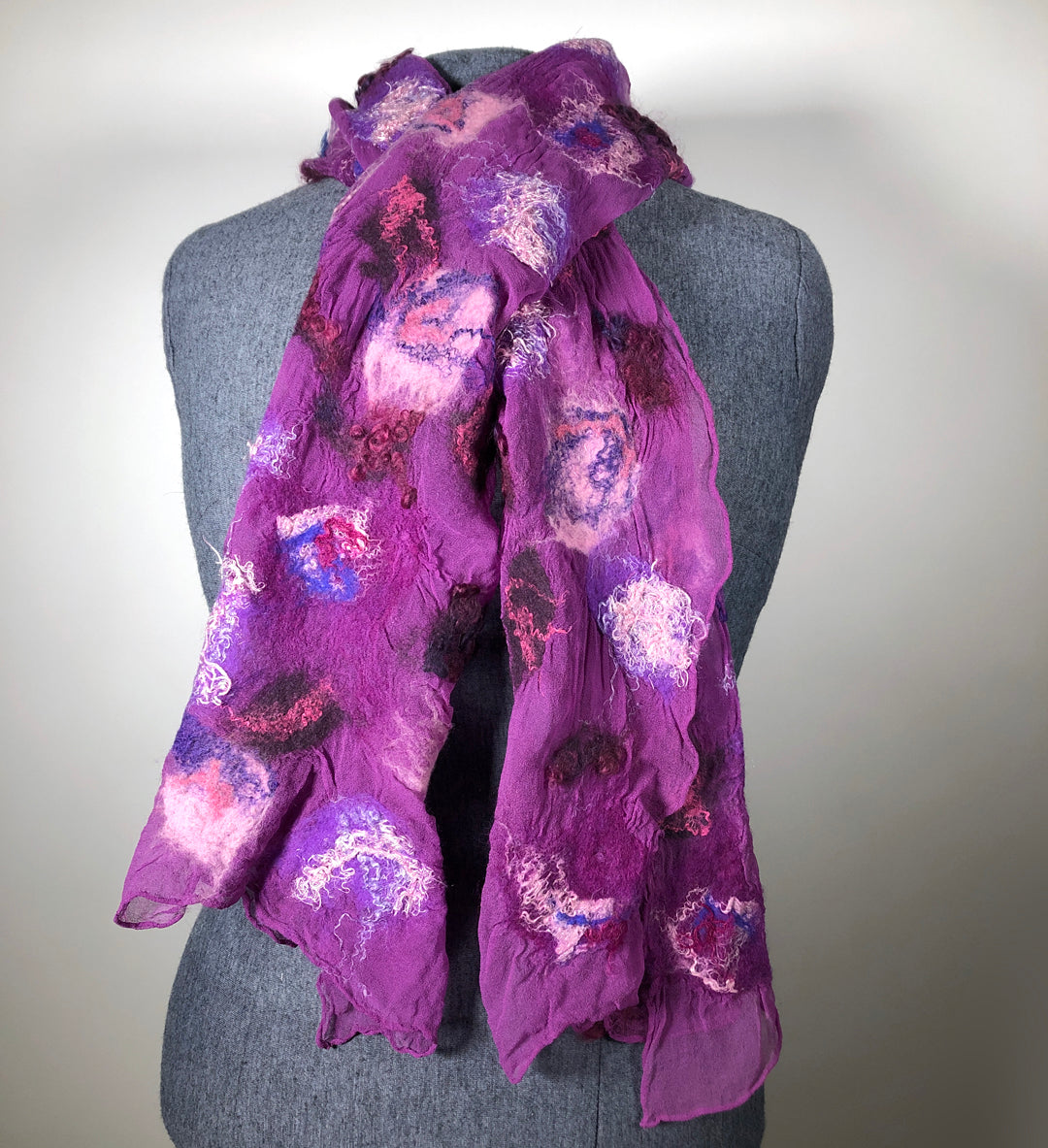 Purple scarf with purple and pink felted sections