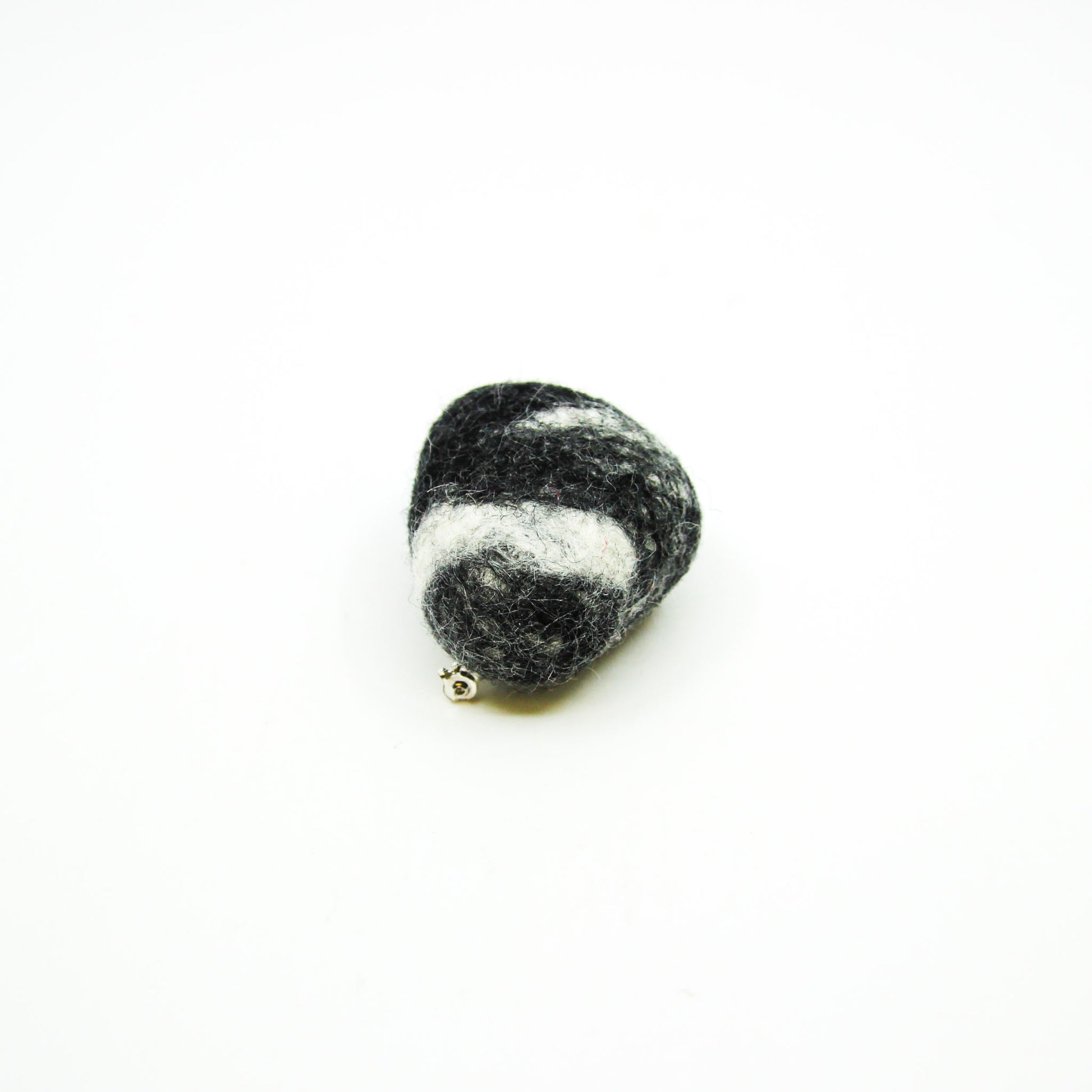 felted rock on a pin