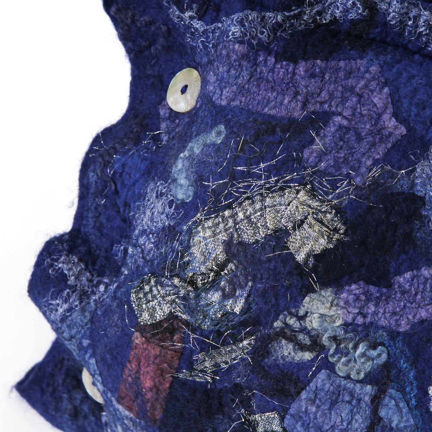 Blue felted pillow close up