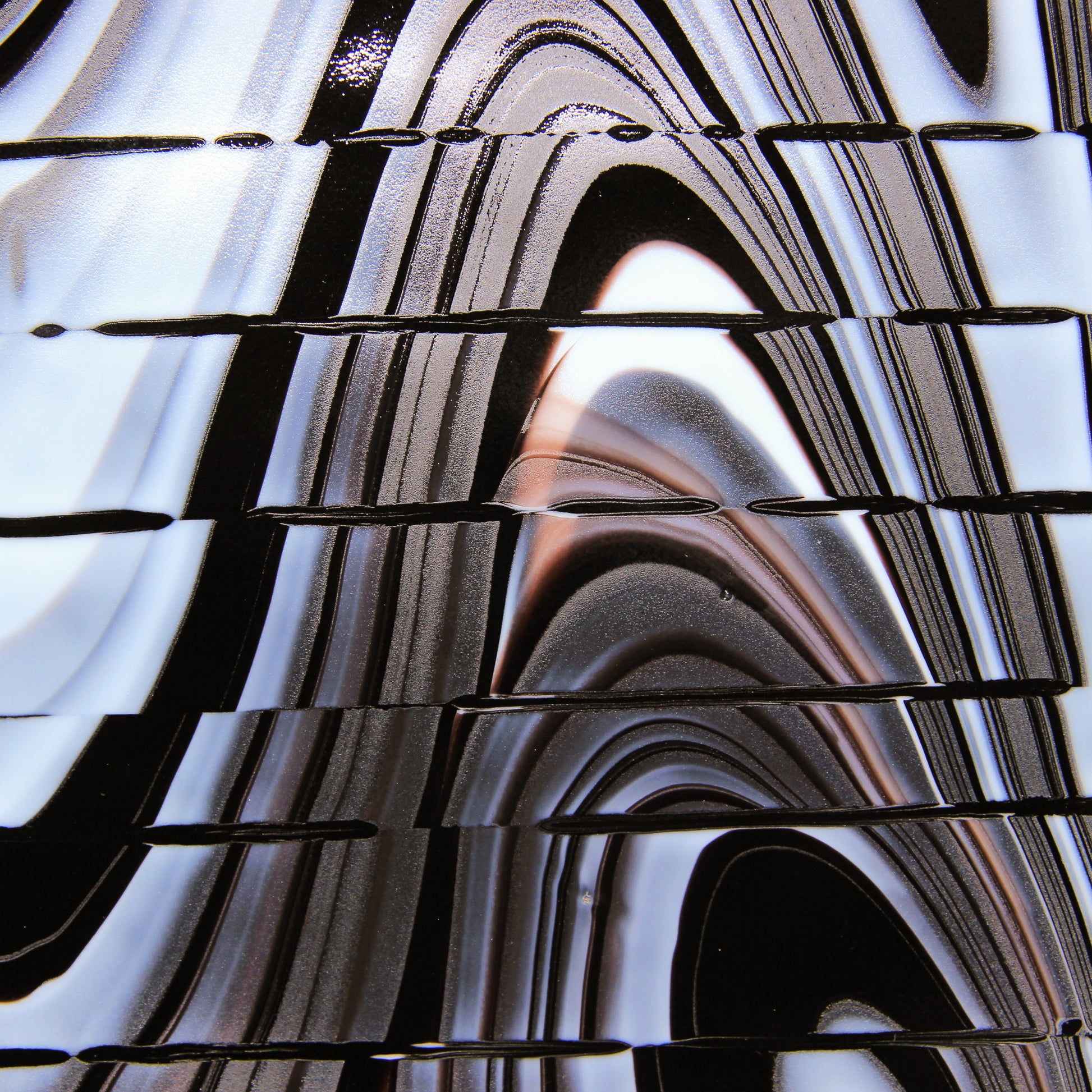 Detail of black and white striped plate