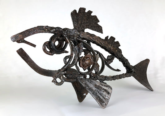Sculpture of a fish made from repurposed metal