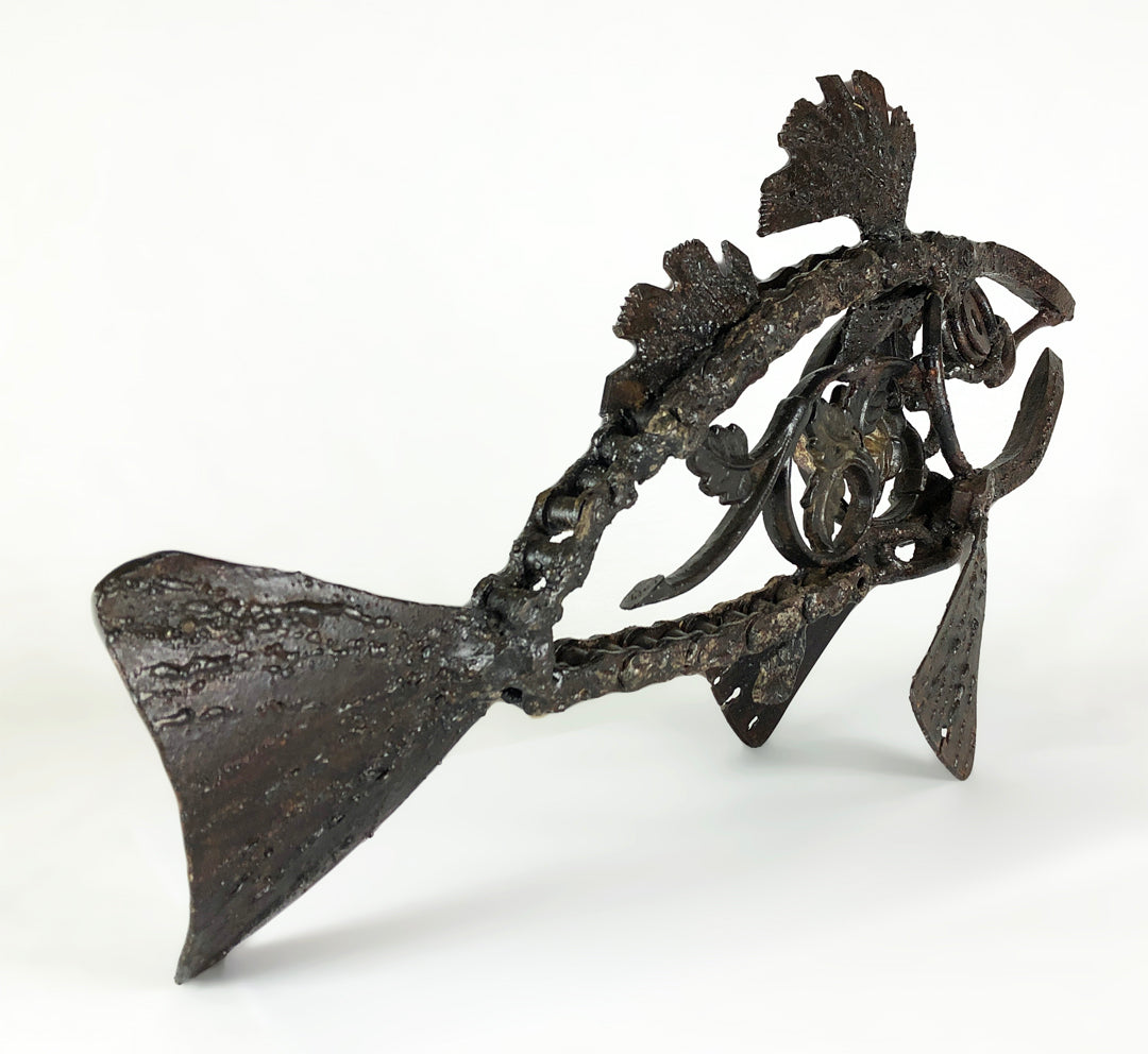 Sculpture of a fish made from repurposed metal
