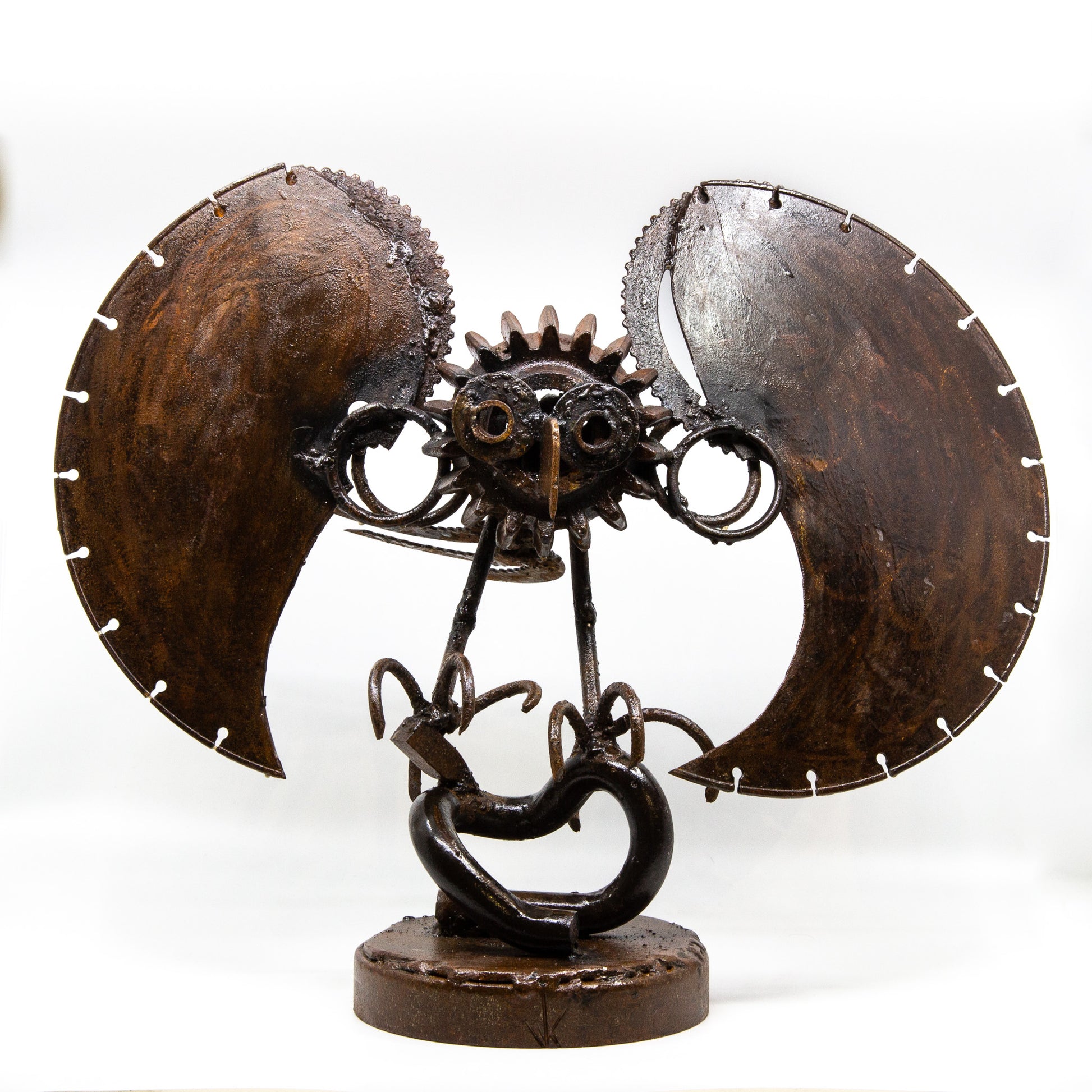 Sculpture of an owl made from repurposed metal