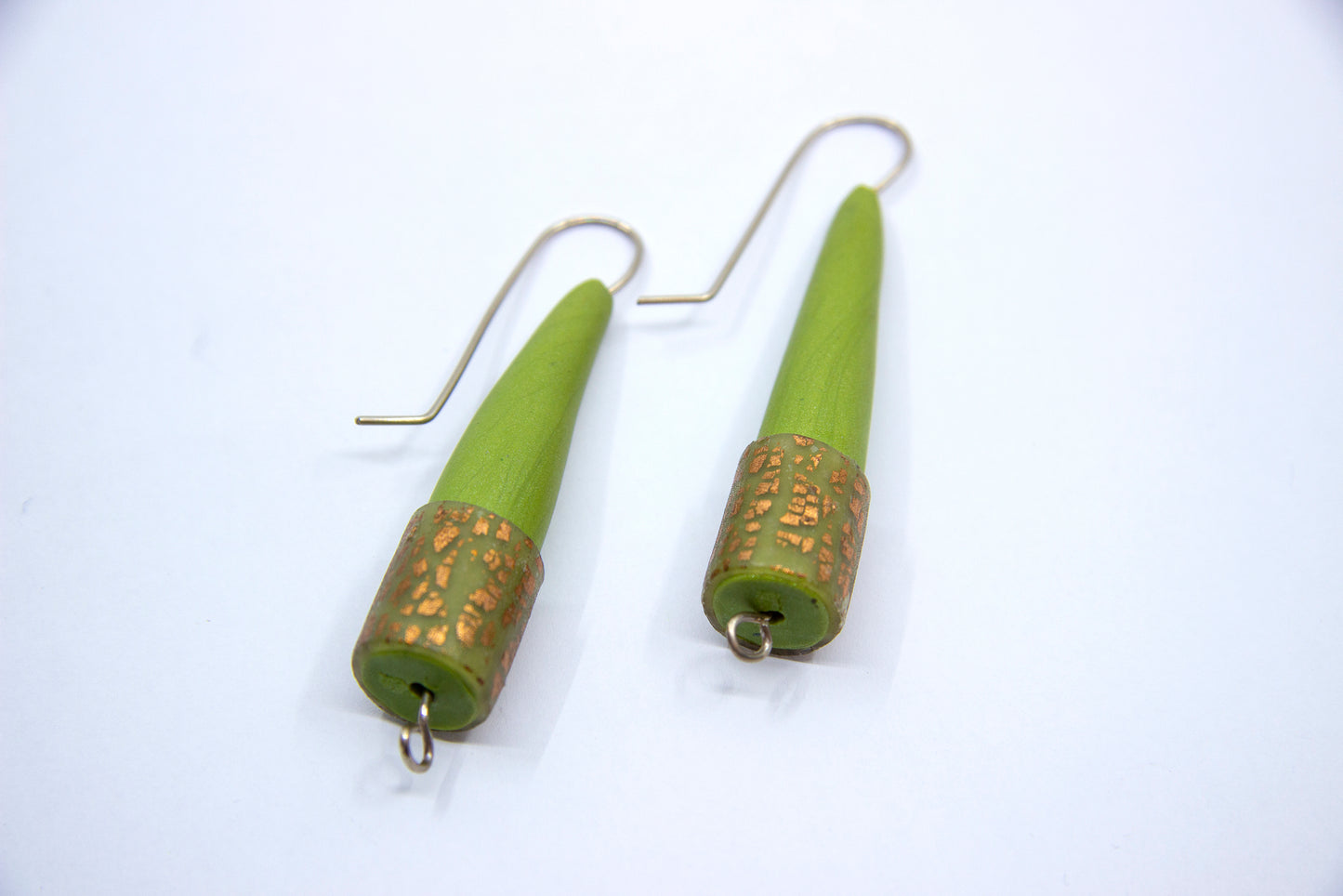 Green cone earrings with gold specks