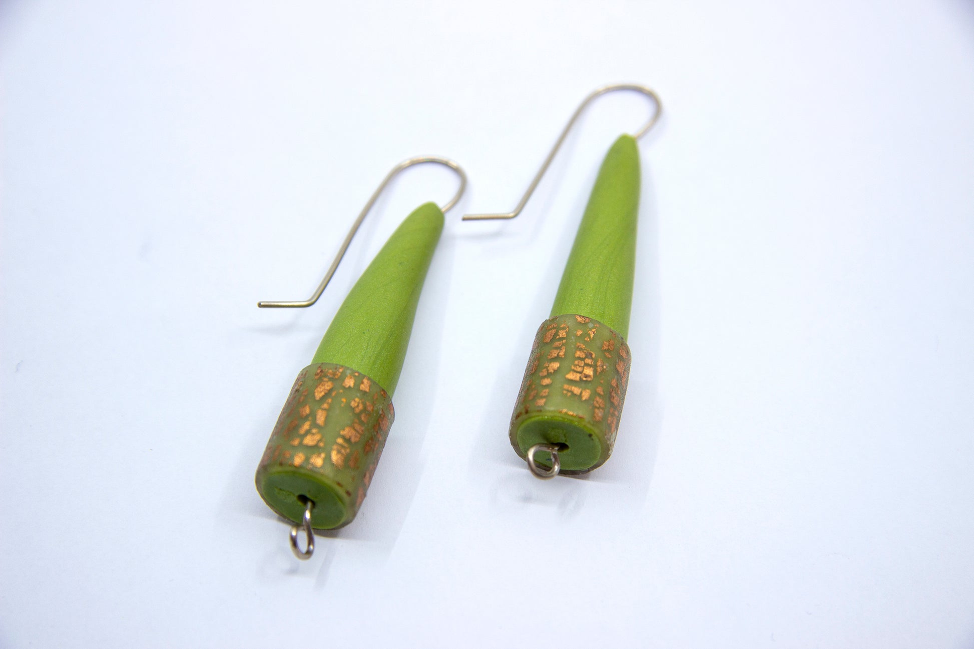 Green cone earrings with gold specks