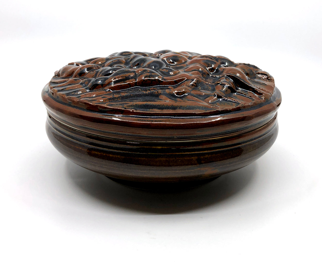 Brown ceramic bowl with lid