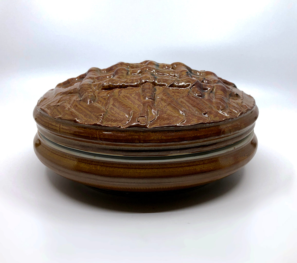 Ceramic brown and gold bowl with lid