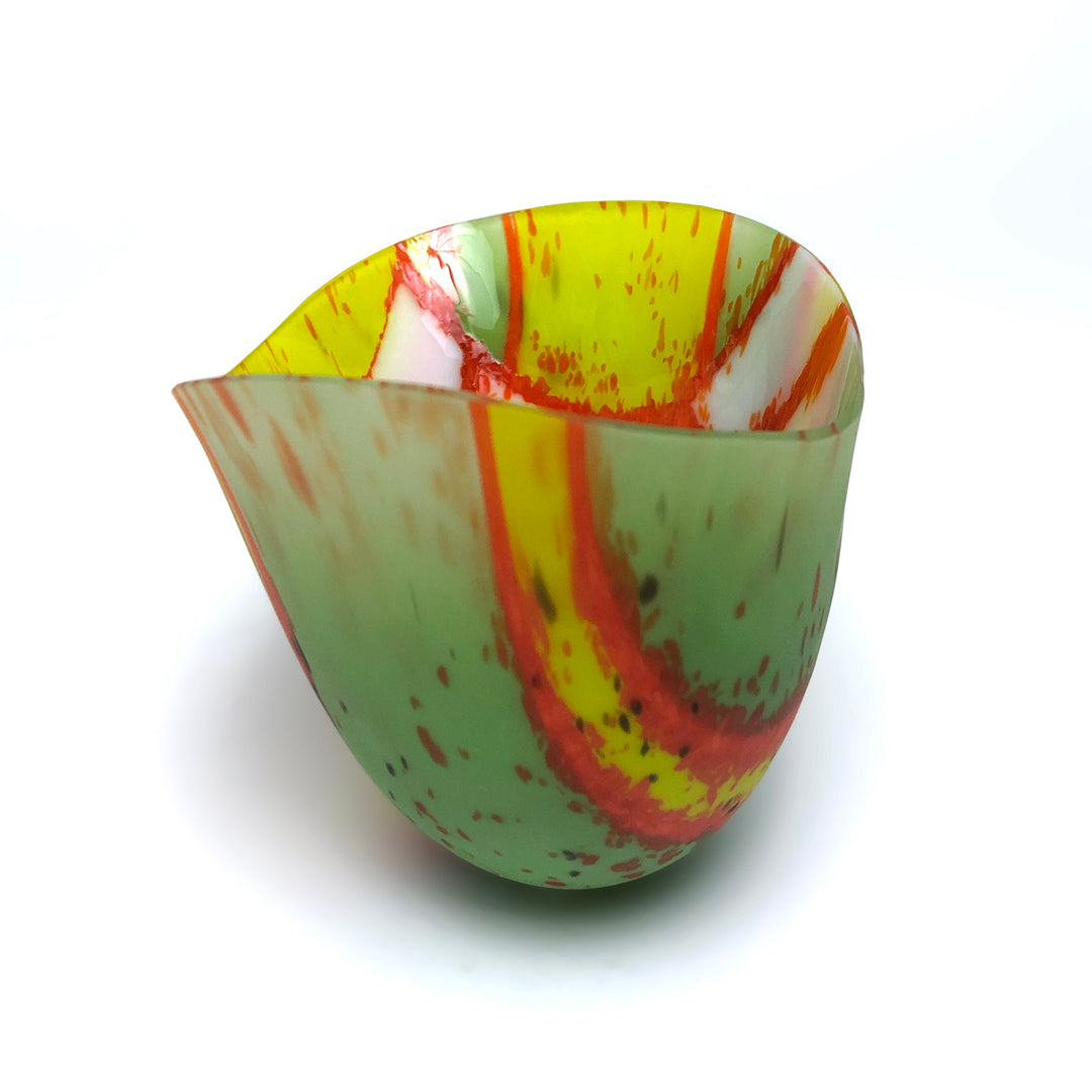 Green, orange, yellow and white glass vessel