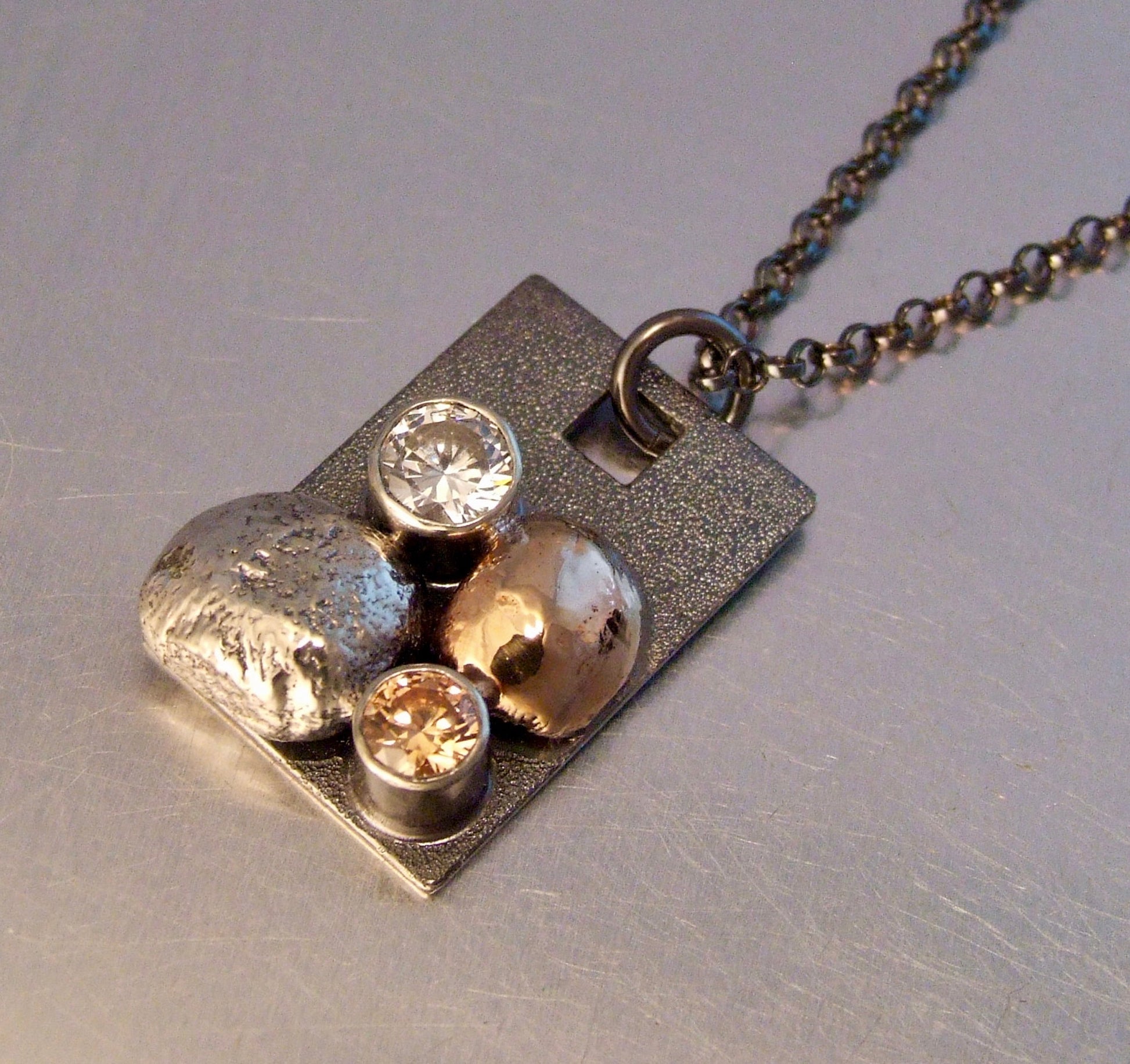 Rectangle pendant with silver, gold, zirconia