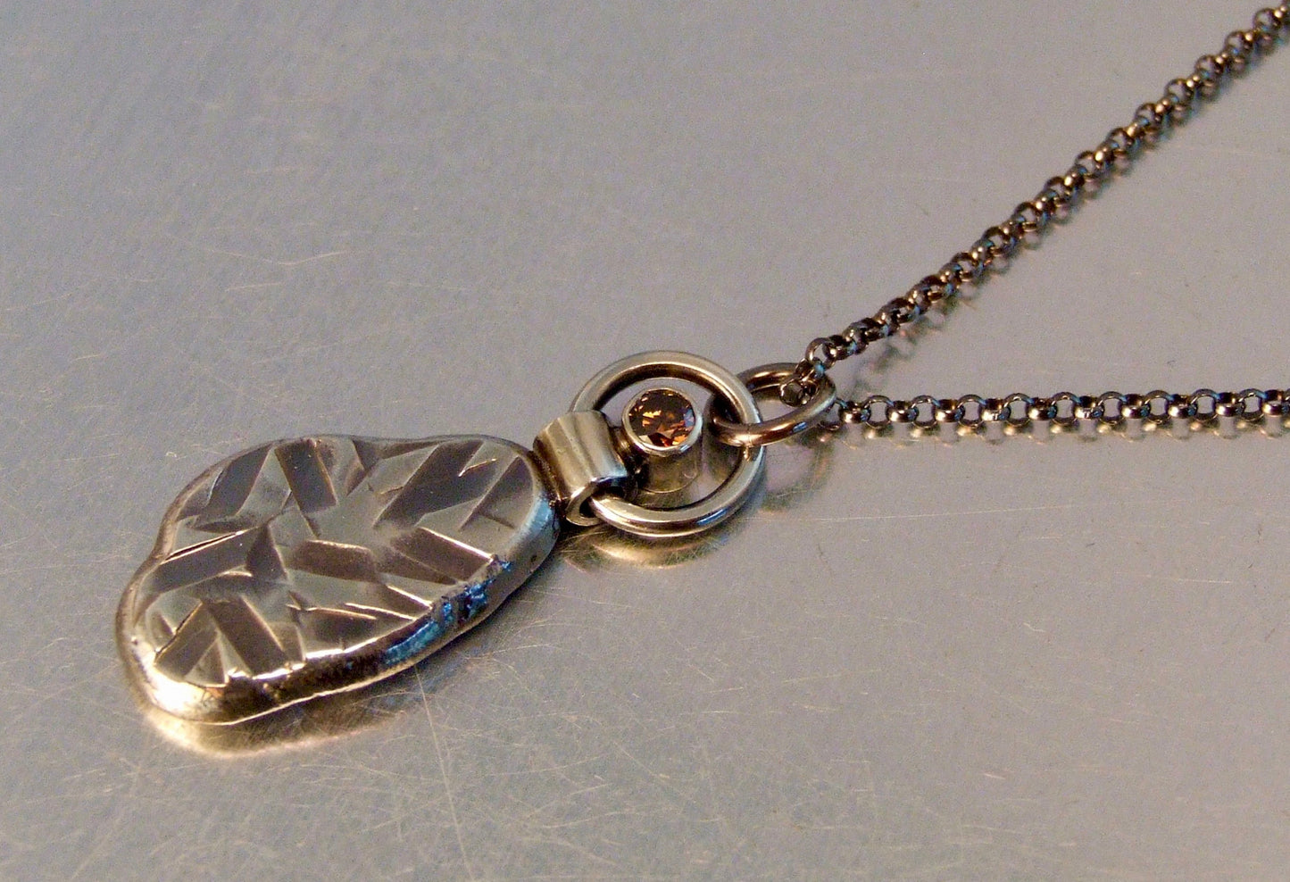 Textured pendant with zirconia