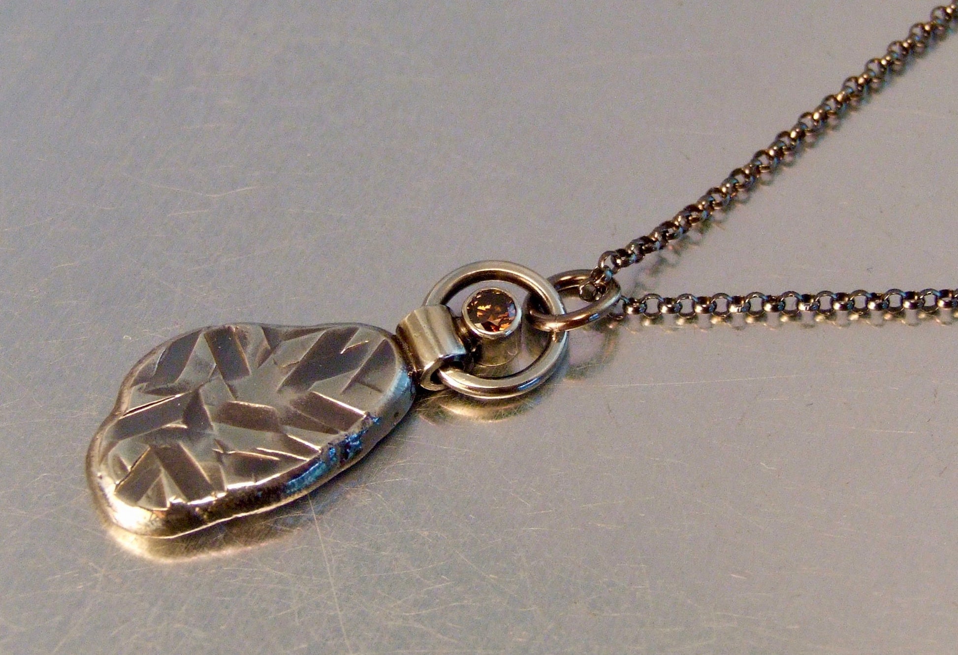 Textured pendant with zirconia