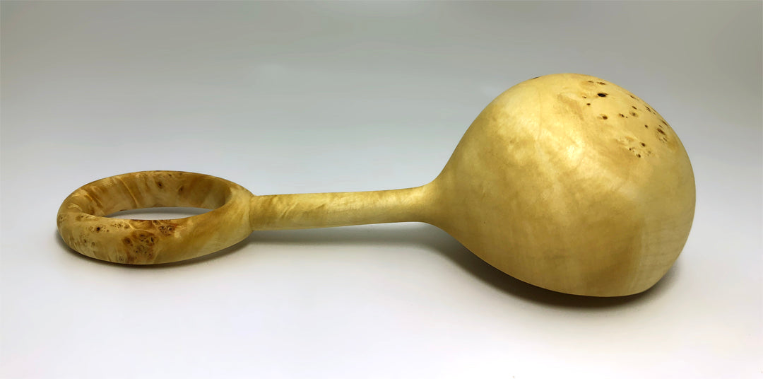 carved wood ladle