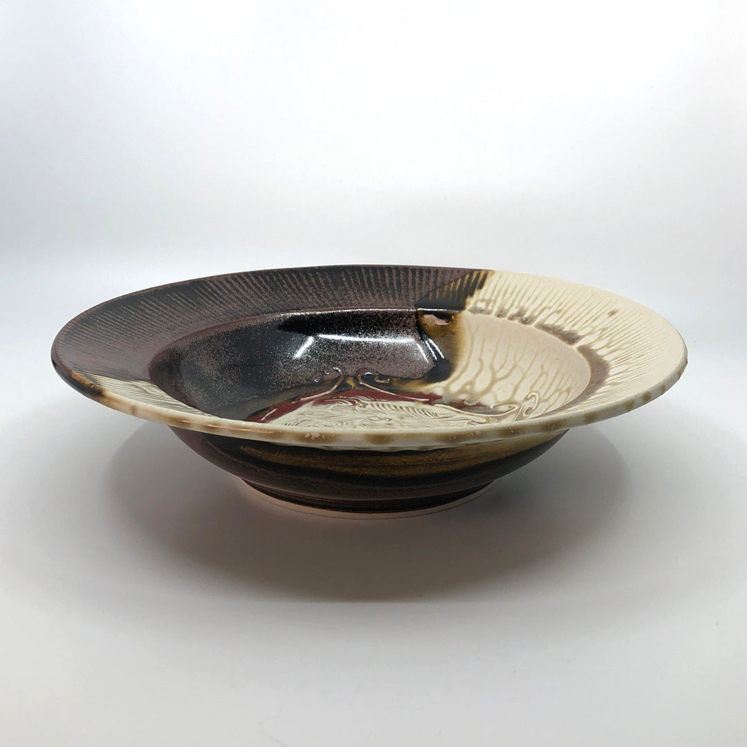 Large cream and brown bowl