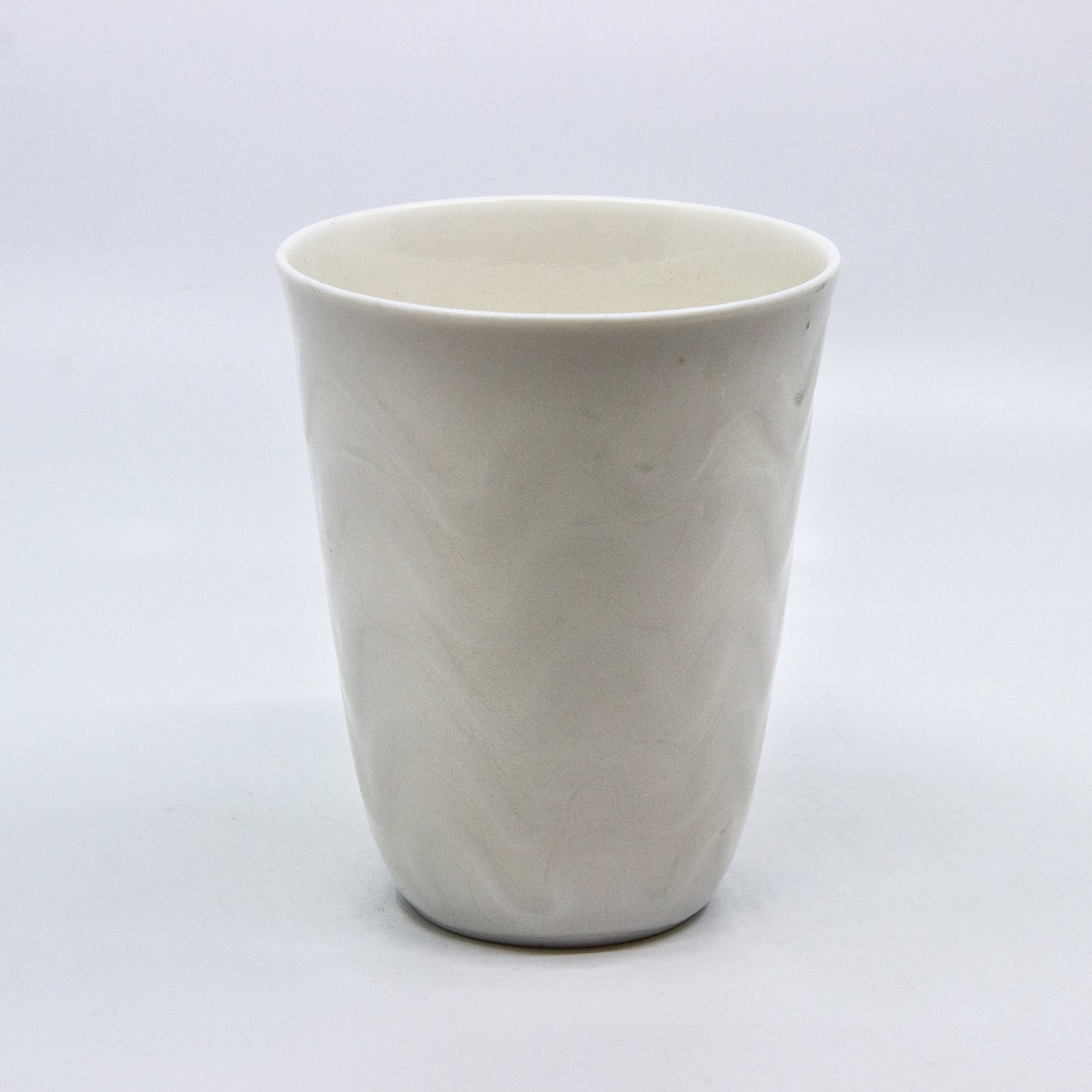 white porcelain candle holder
