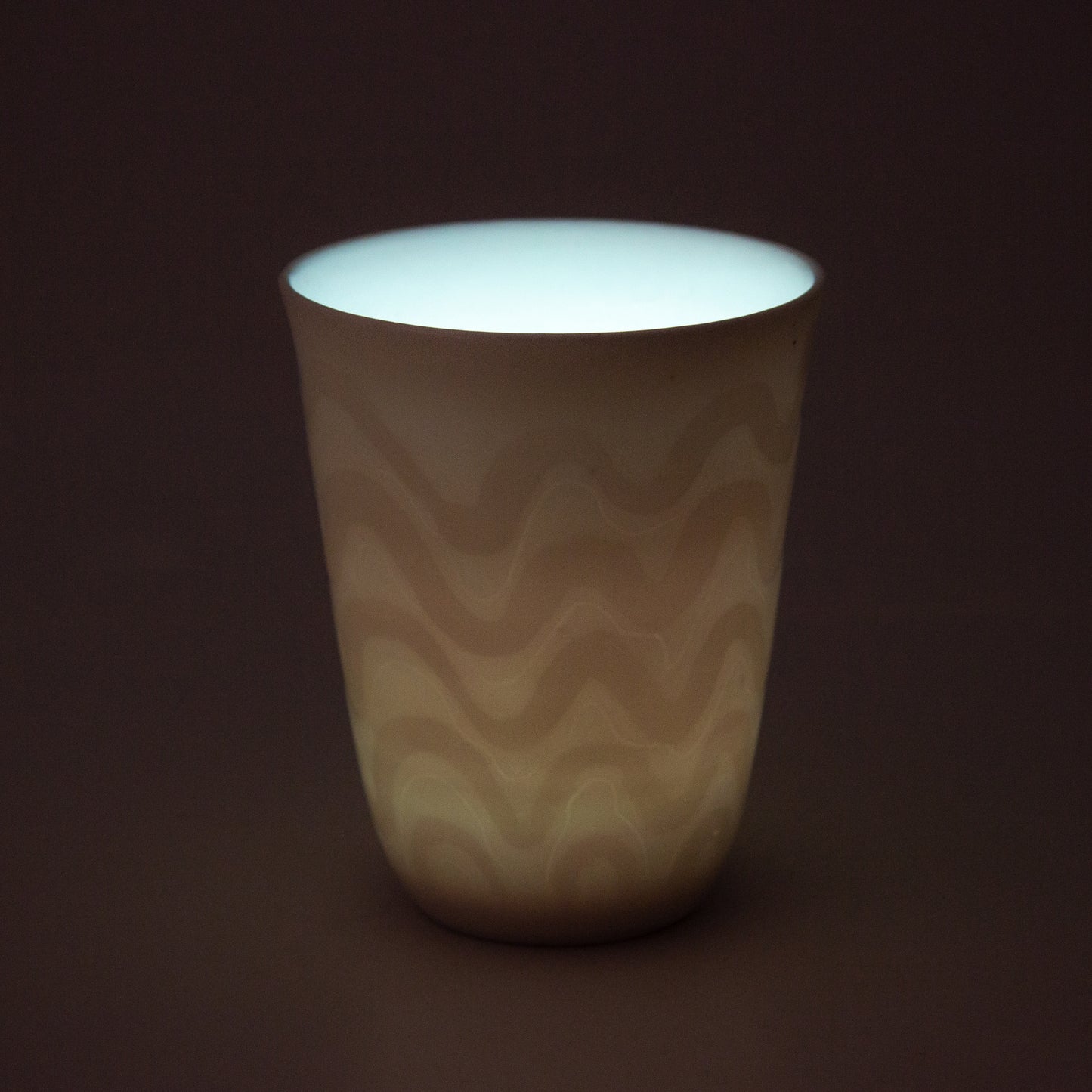 white porcelain candle holder