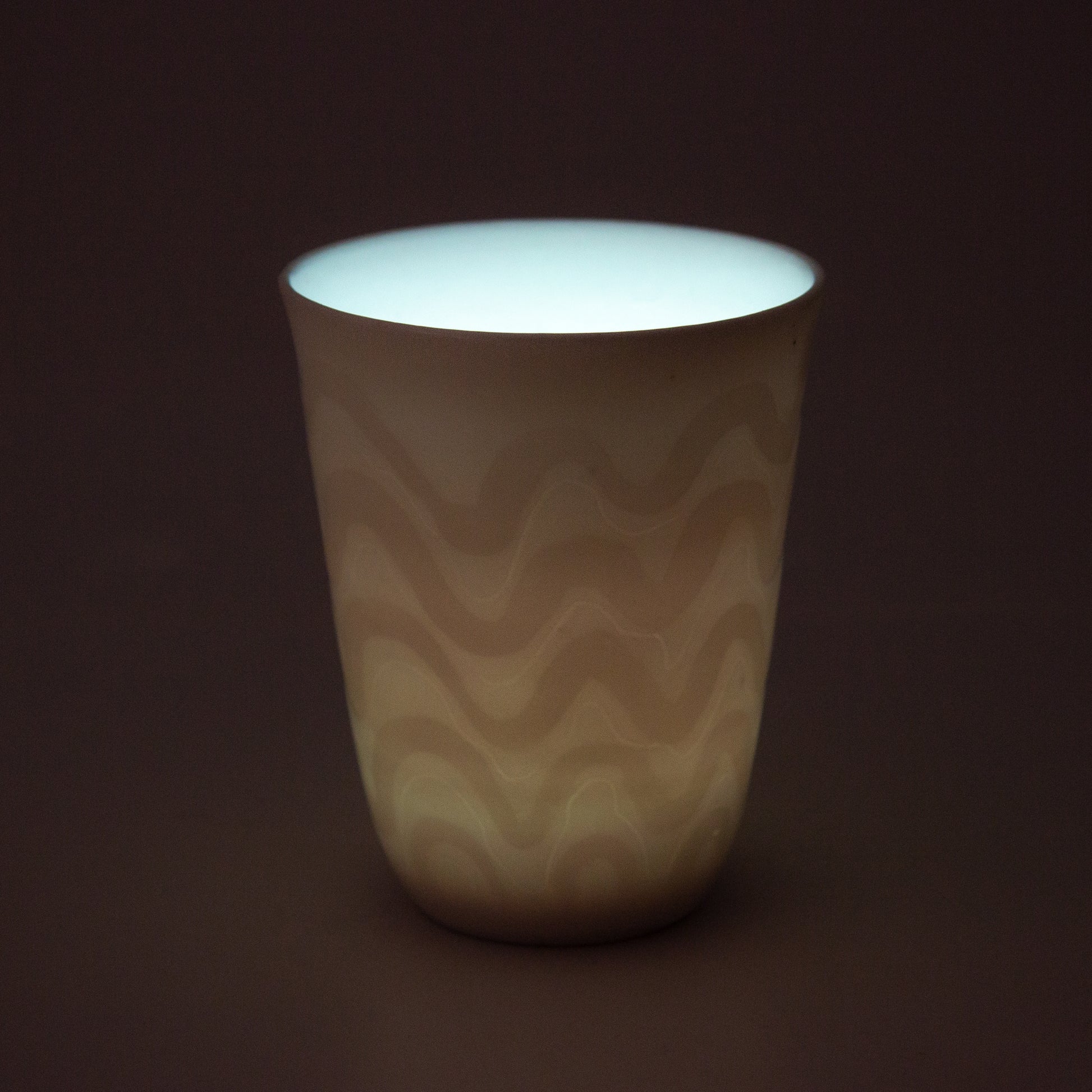white porcelain candle holder